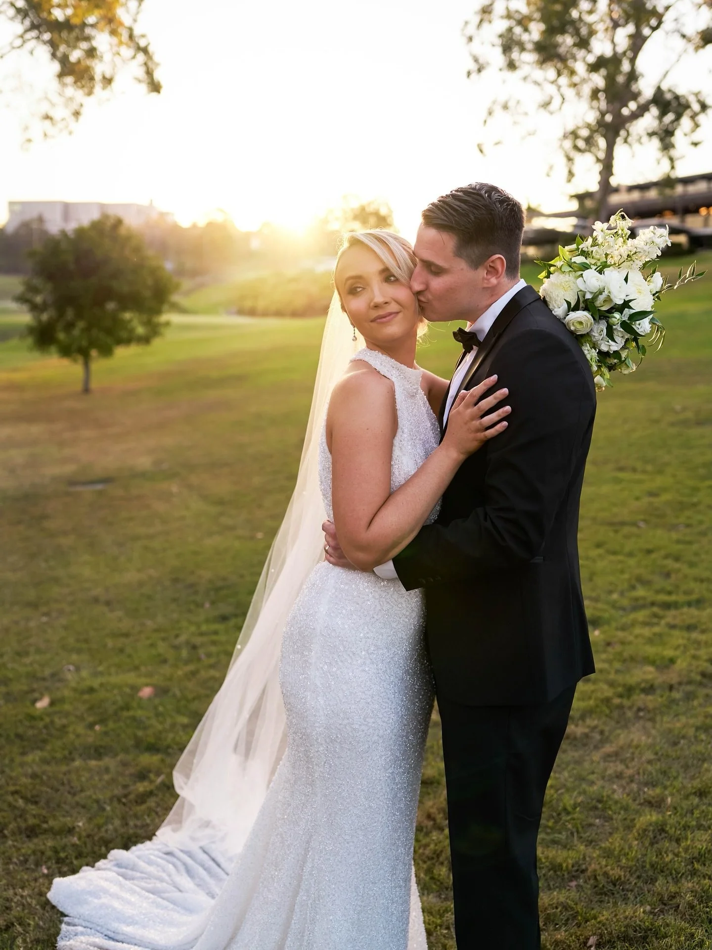 Yes to forever for our very first NOAM bride ✨ 
Our beautiful bride Caity married her love in this high-neck fully beaded beauty by @evalendel— she’s a vision of old Hollywood glamour. And just wait until you see the most STUNNING low ba