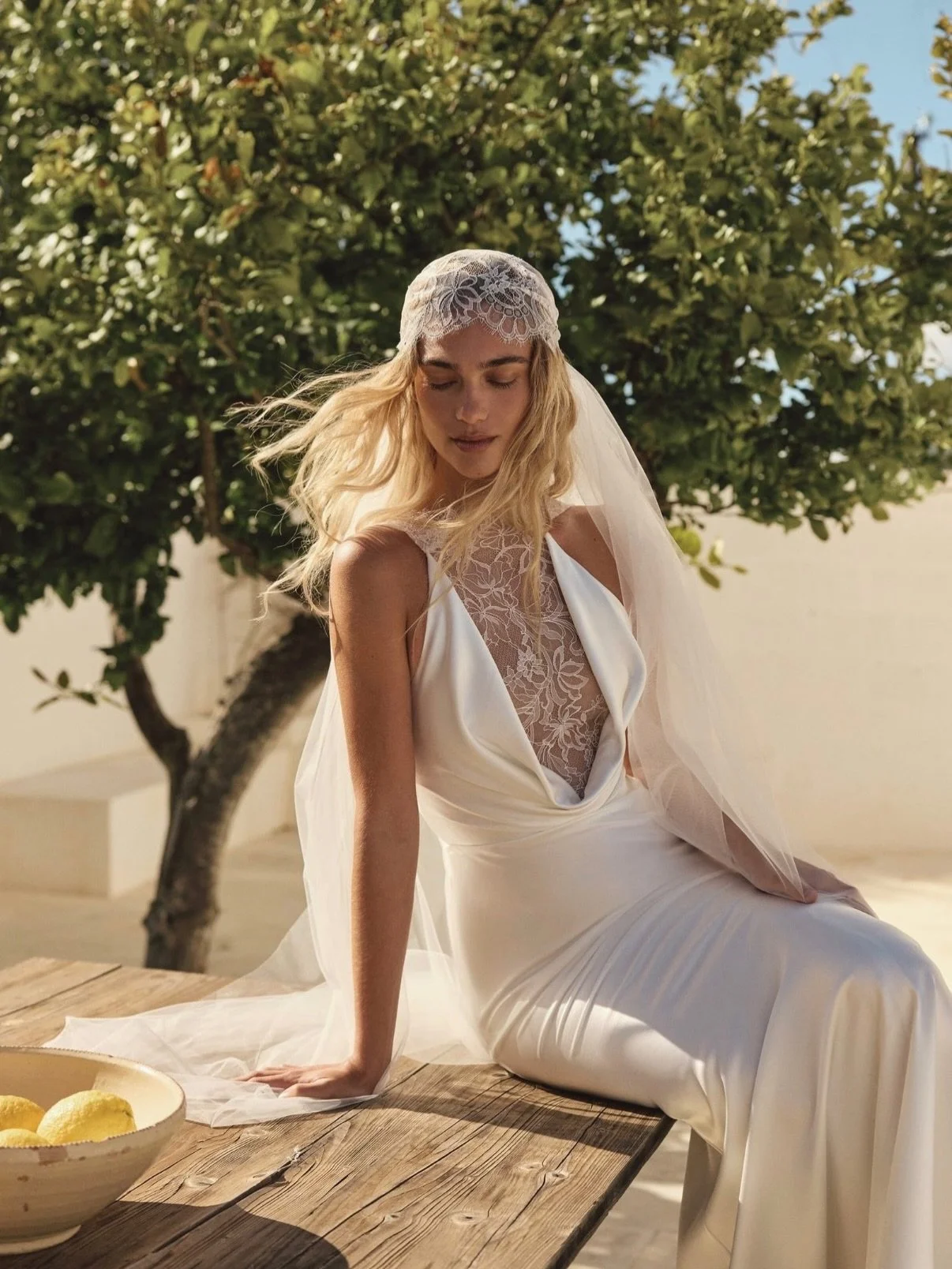 New arrival alert. Arber by @evalendel has landed and she is everything the minimal bride has been waiting for.

A fluid satin sheath that traces the body effortlessly paired with a high illusion neckline with the prettiest and most delicate lace det