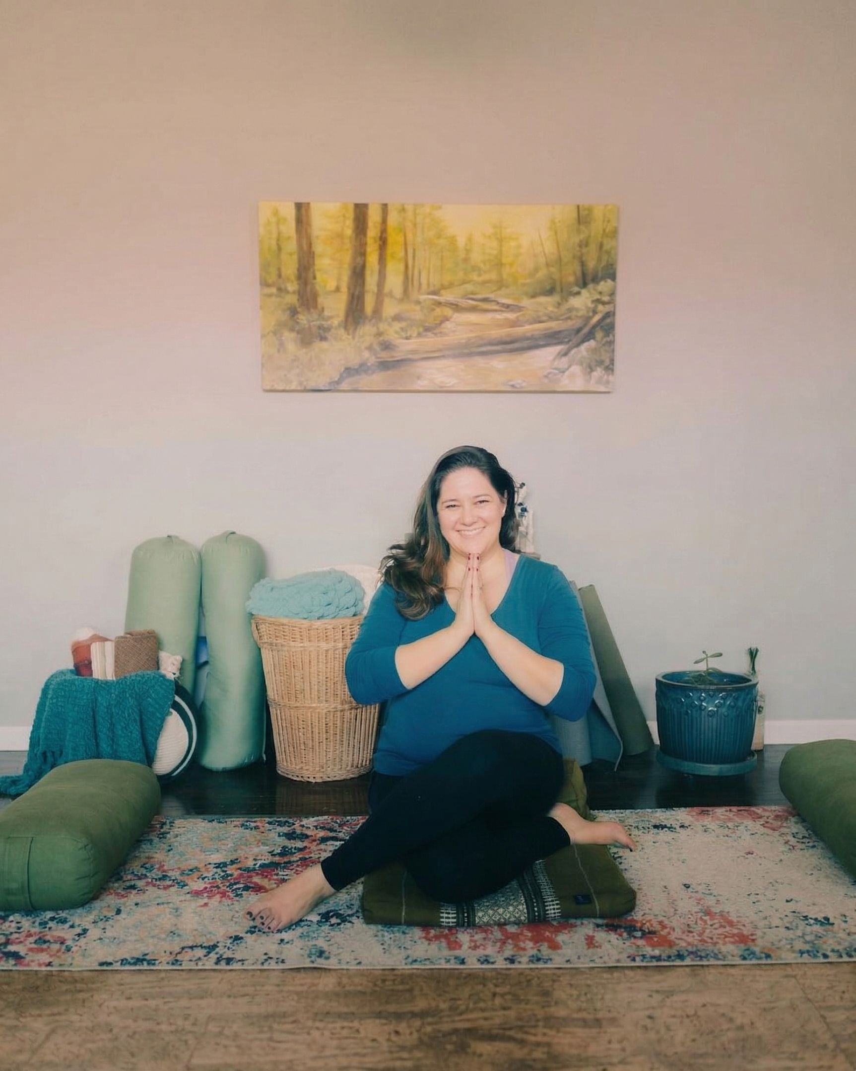 woman sitting cross legged in a yoga pose