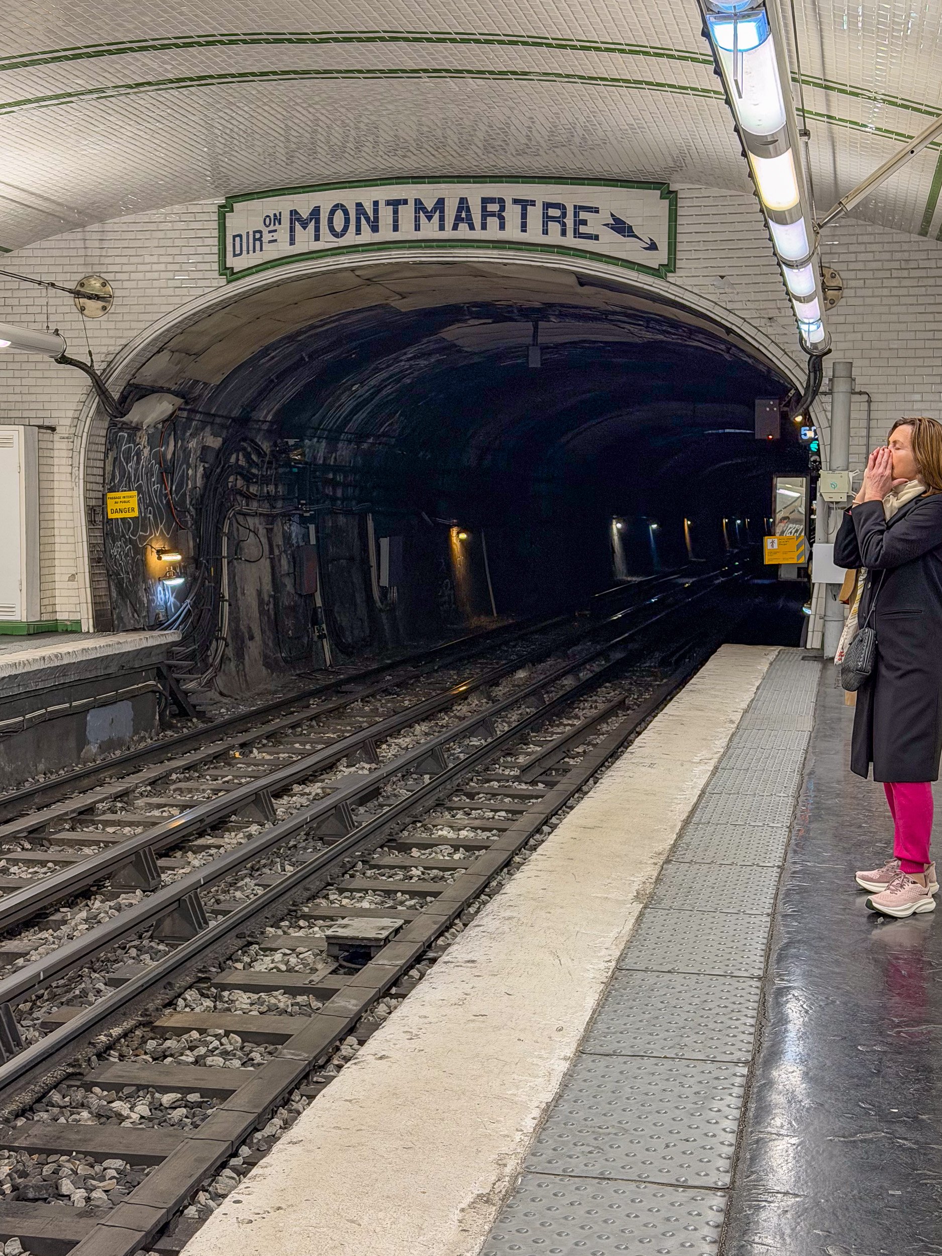 Montmartre sign over a Metri tunnel.