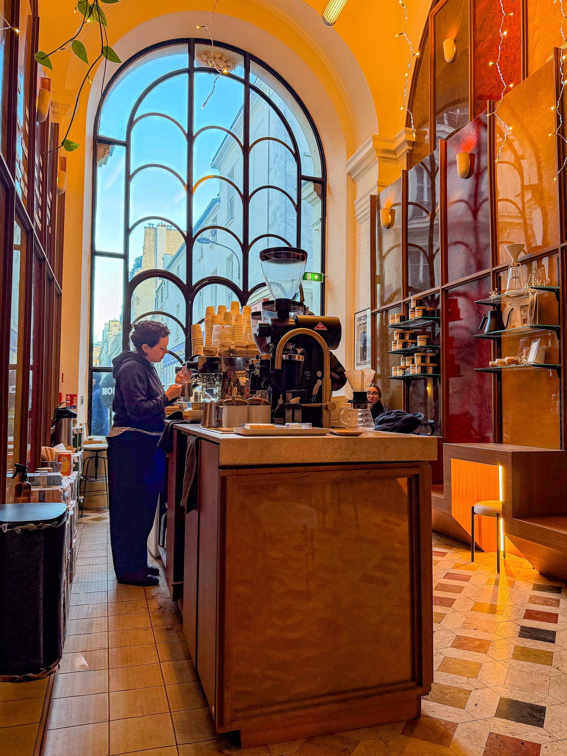 Noir coffee shop in an old passageway.