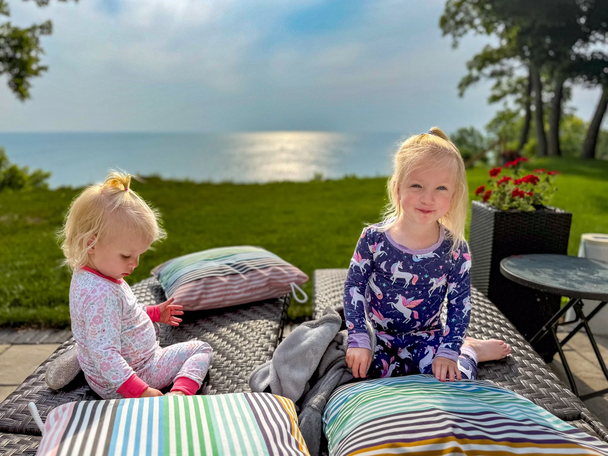MacKenzie and Amelia lounging on the patio.jpg