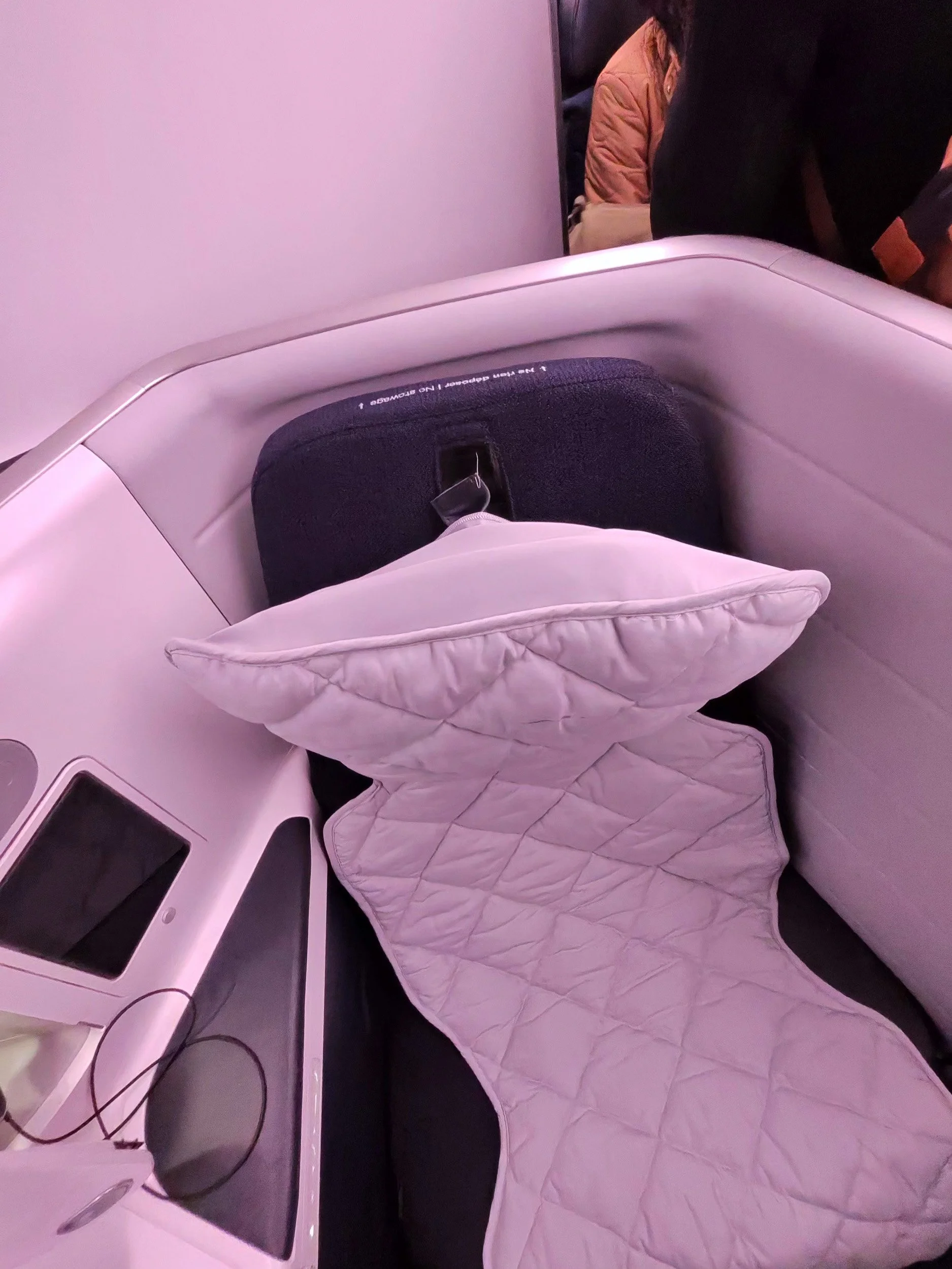 More important than the bed linens and amenities was having room to spread out for the night. Thanks, airline miles.
