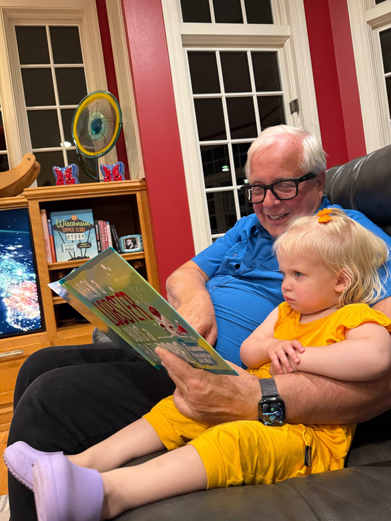 Reading grandpa a book