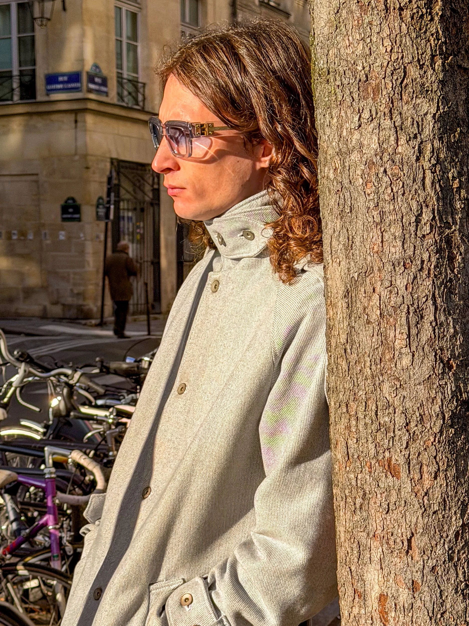 Outside, a Parisian sauntered to work. 