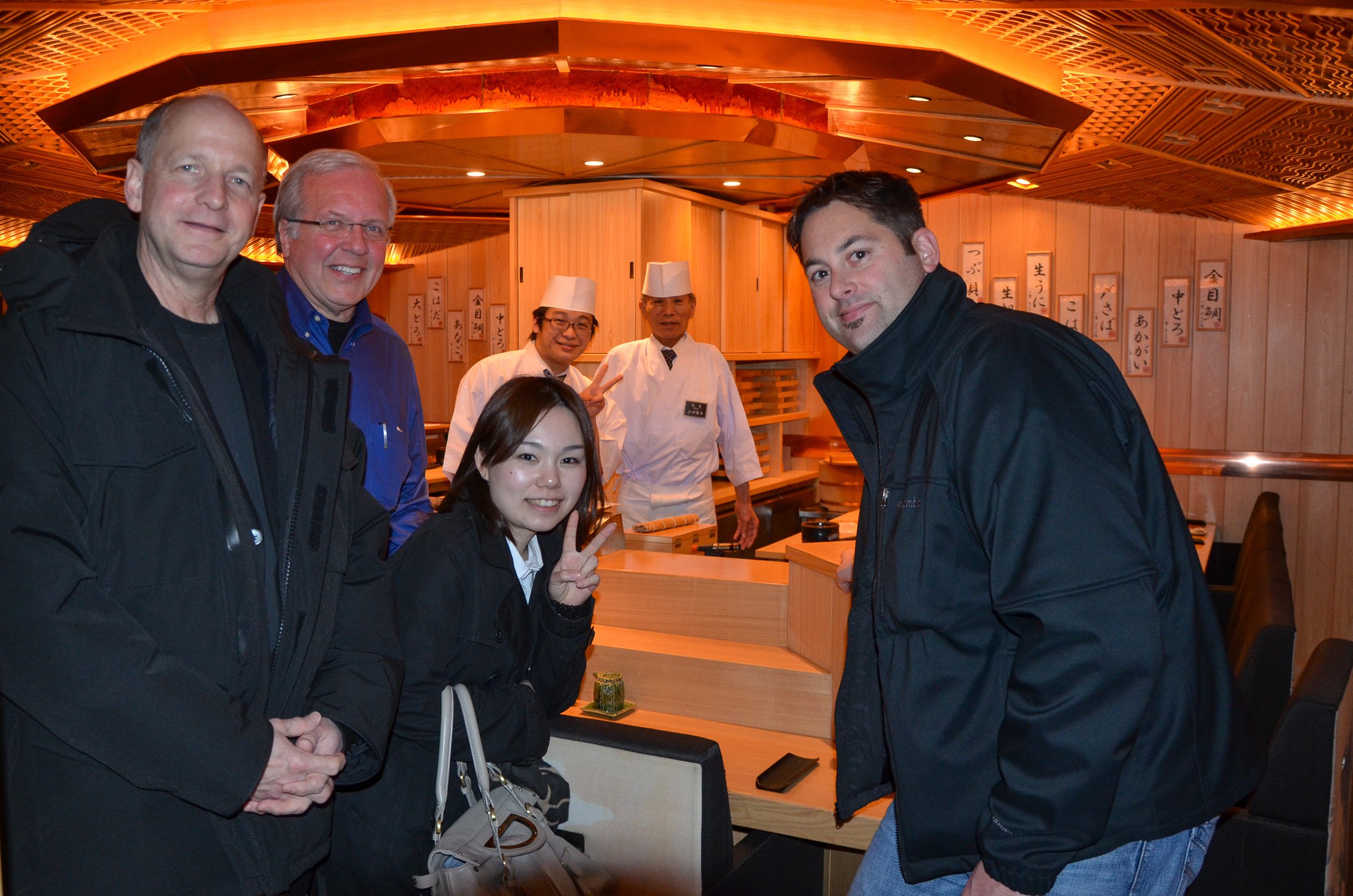 The team enjoys a sushi dinner