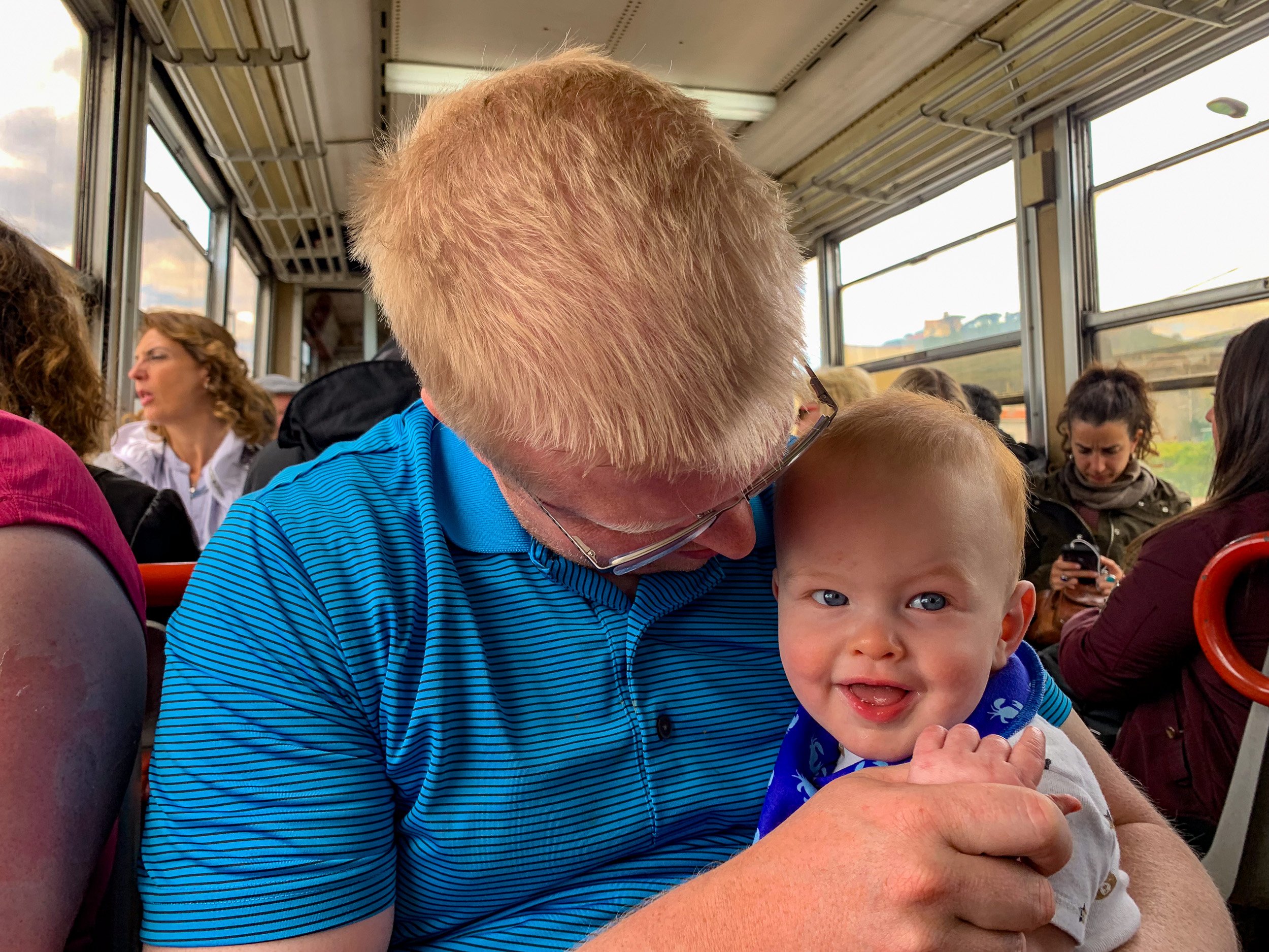Charming the other train passengers