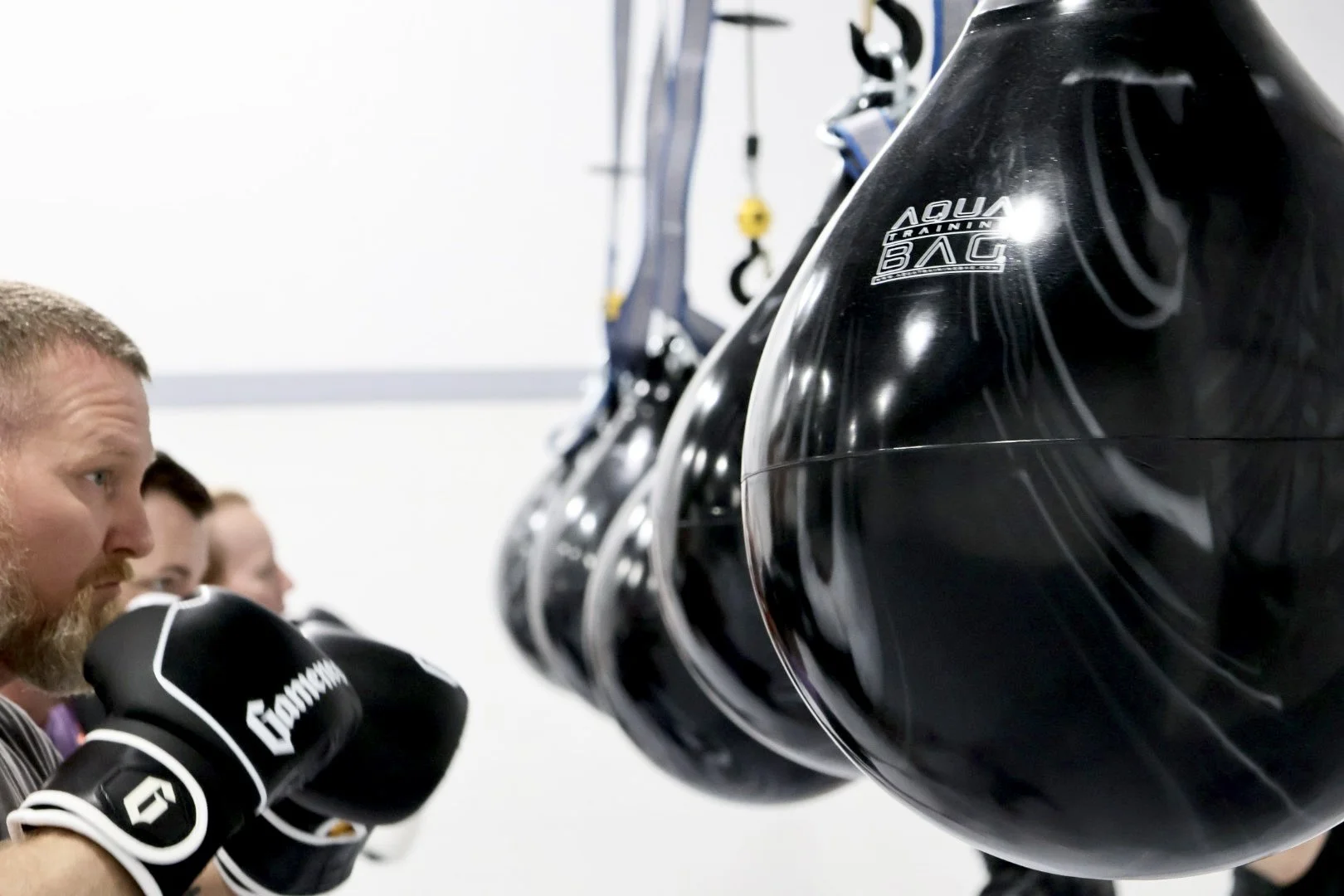 Boxing class at 4 Korners Jiu-Jitsu in Frisco, TX, with participants practicing boxing techniques and drills under the guidance of an experienced coach.