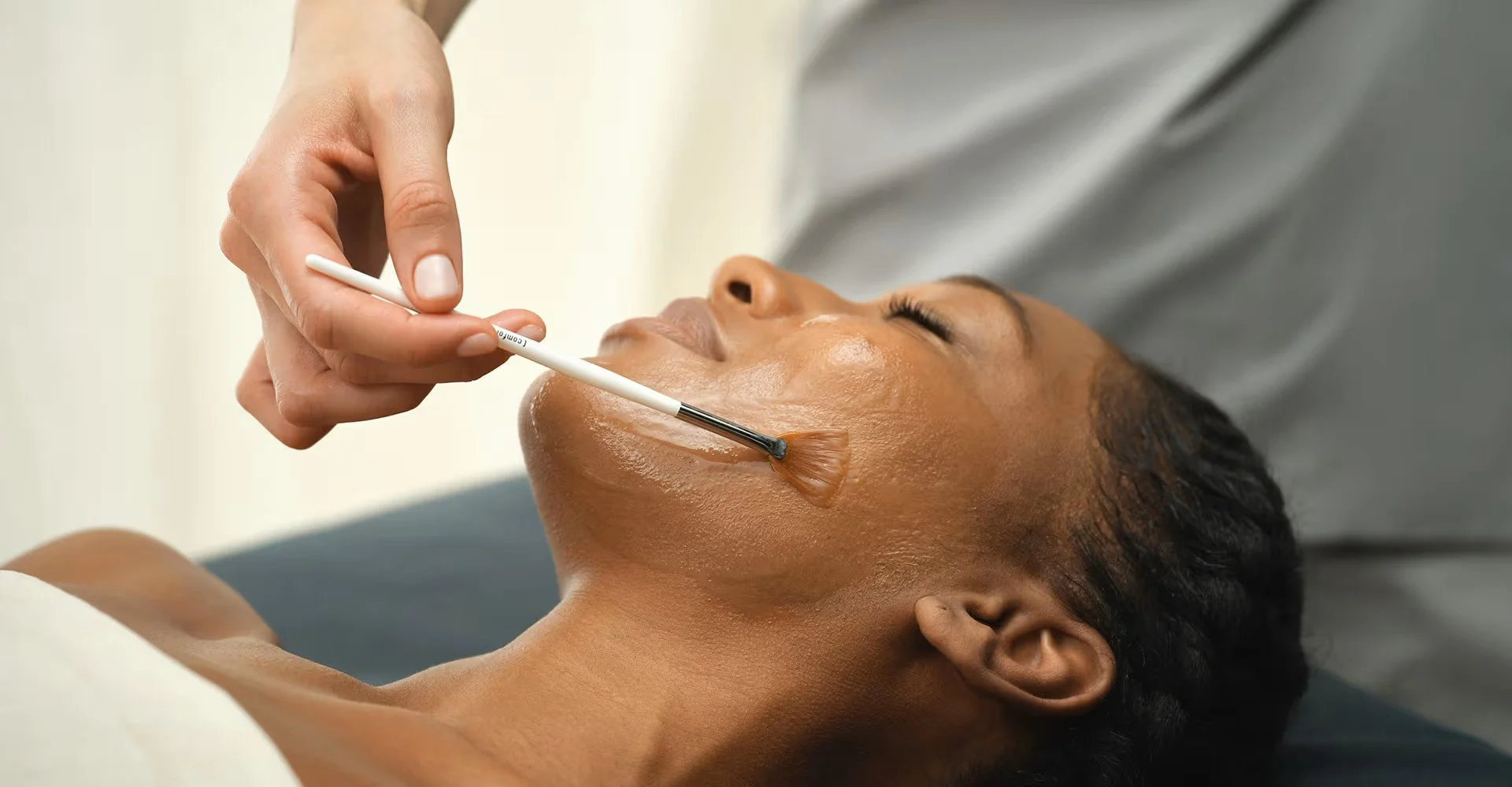 Woman receiving a glow peel