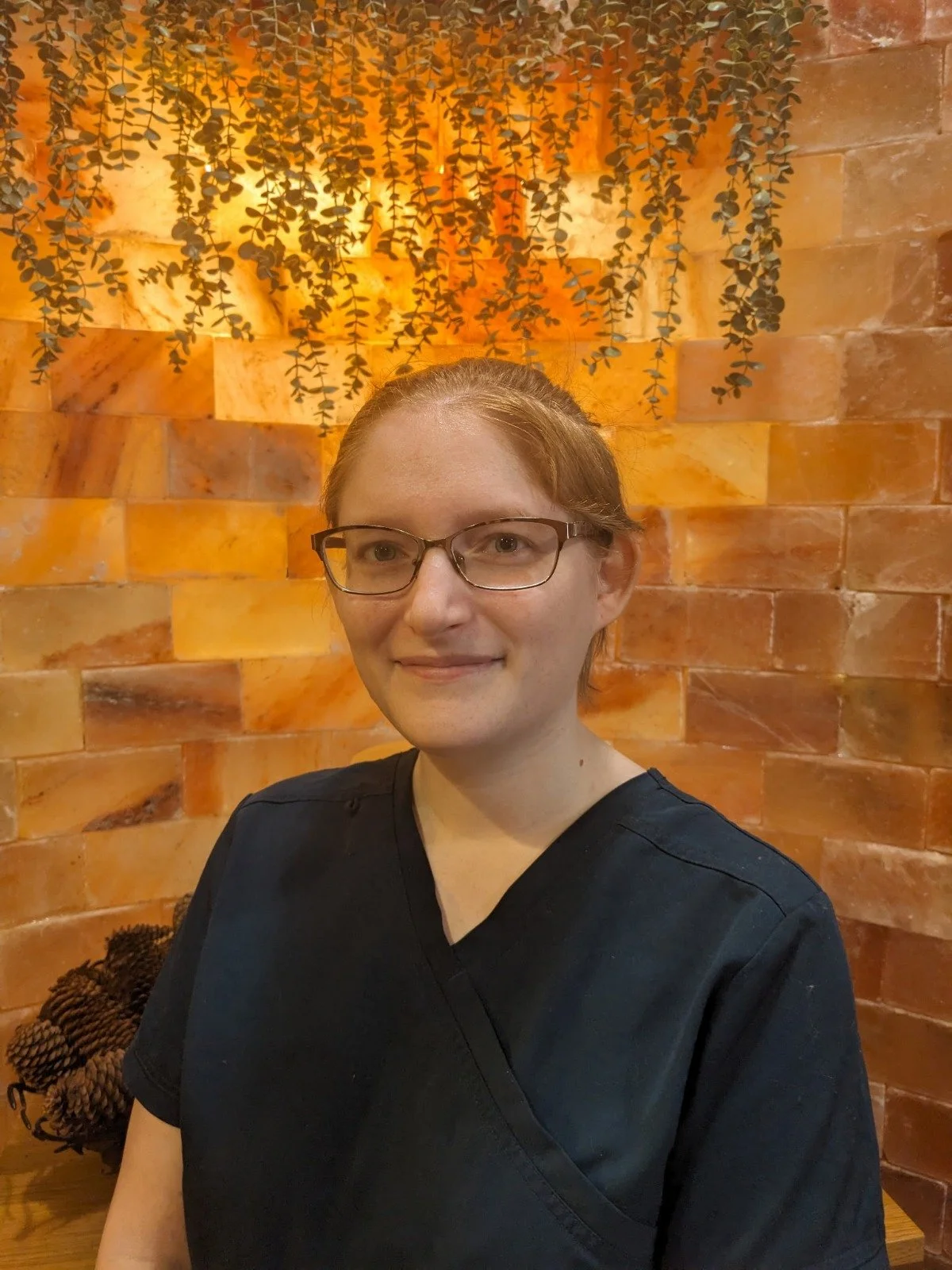 Darian Luchka pictured a female in a black dress.