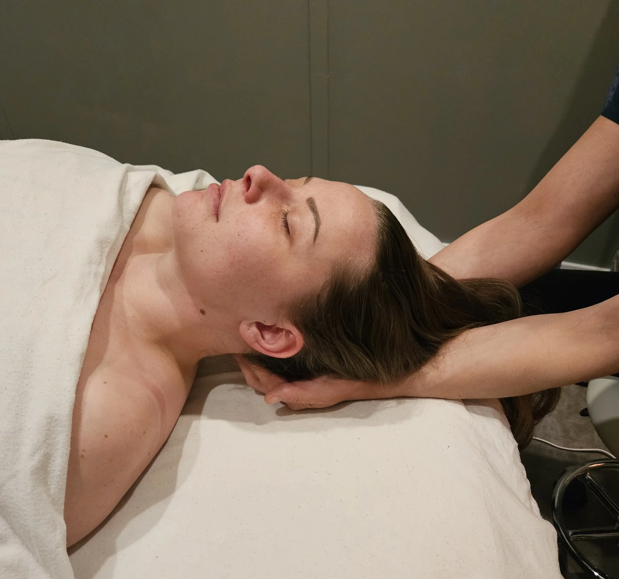 Relaxing Nordic head and neck massage performed by a registered therapist in Leduc, Alberta