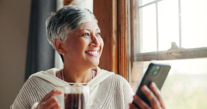 Mature-woman-phone-online-therapy-window