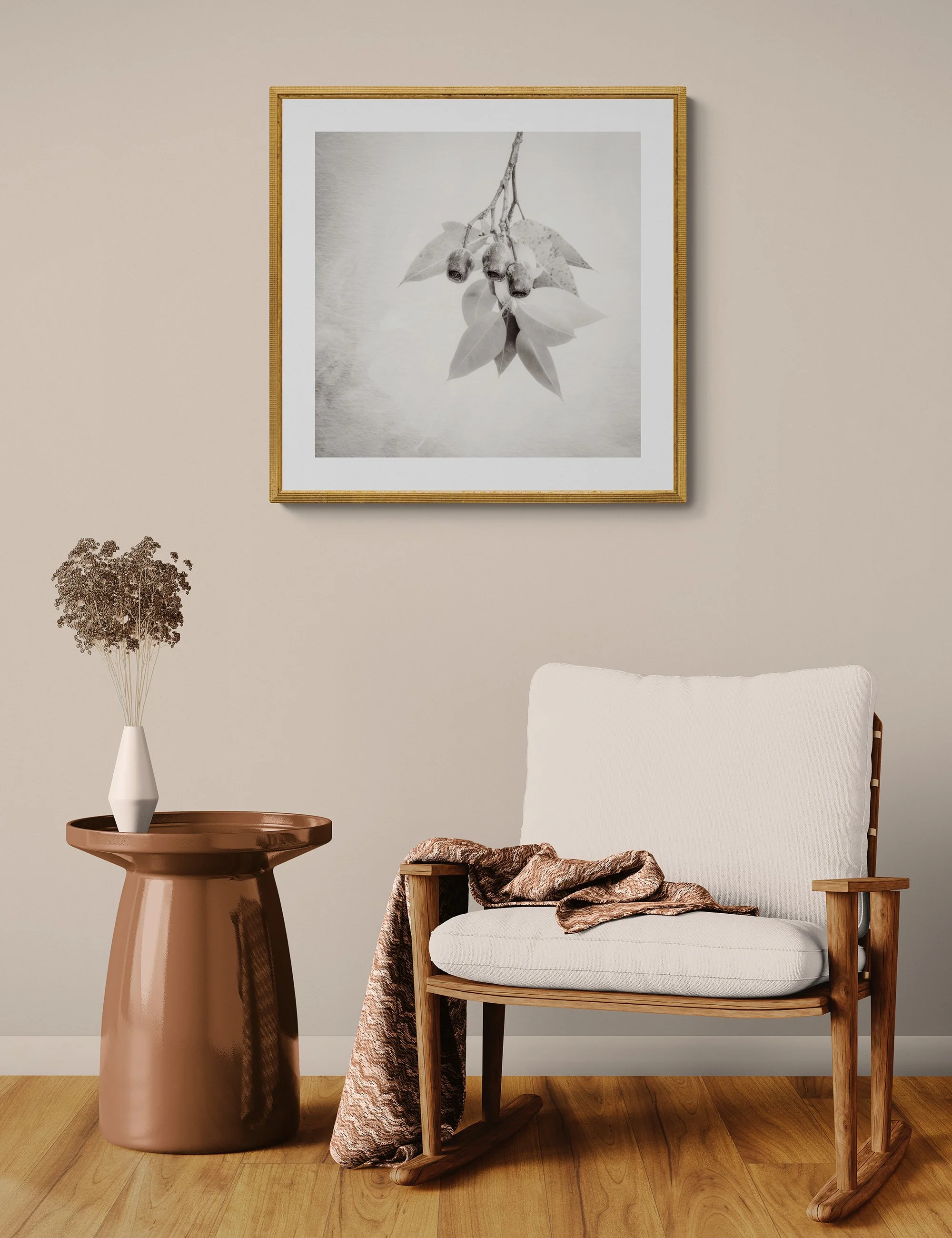 "Now and Then" by Ian J Muirhead displayed as a framed botanical fine art print in a warm neutral contemporary interior with timber chair and side table.