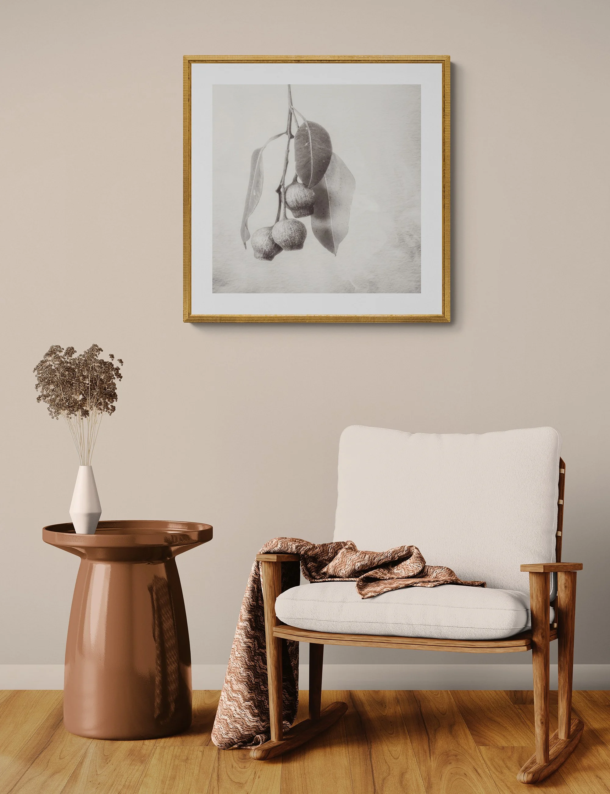 "Threefold Harmony" by Ian J Muirhead displayed as a framed botanical fine art print in a warm neutral contemporary interior with timber chair and side table.