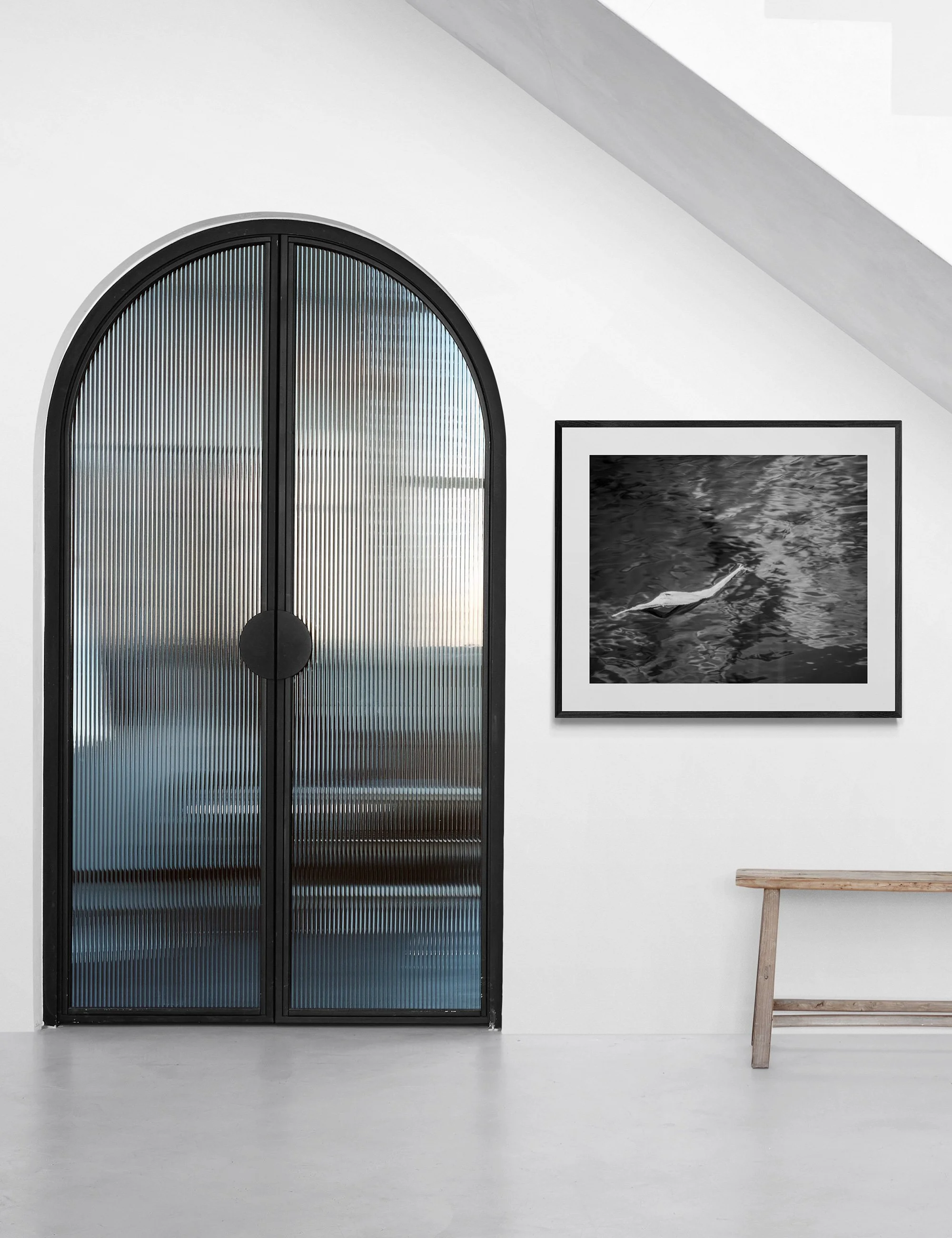 "Unbound" is a conceptual infrared fine art photograph from the Drifting Destinies series displayed in a minimalist contemporary interior.