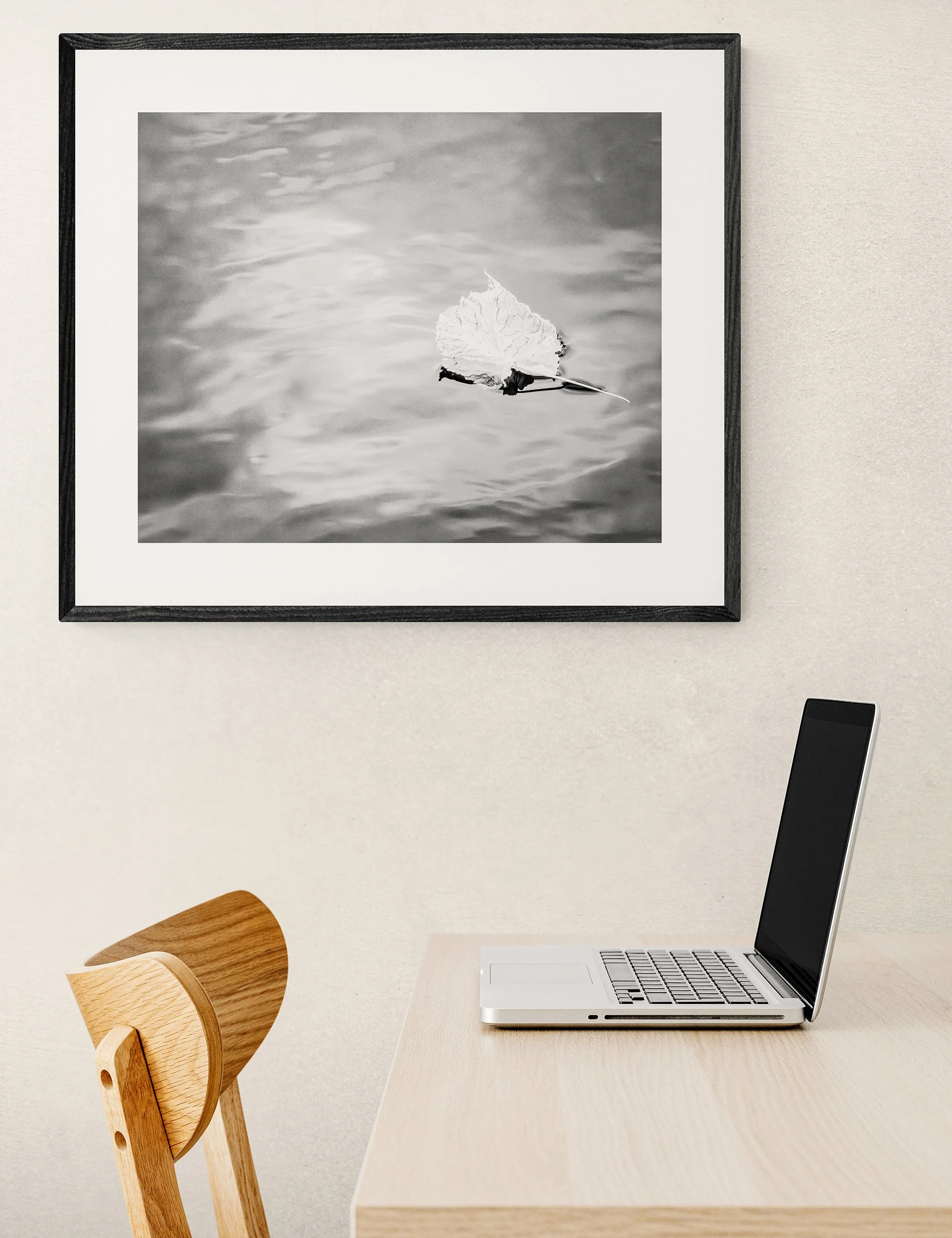 “Tranquility” from the Drifting Destinies collection by Ian J. Muirhead Arts, displayed in a contemporary home office with a timber desk, chair and black frame.