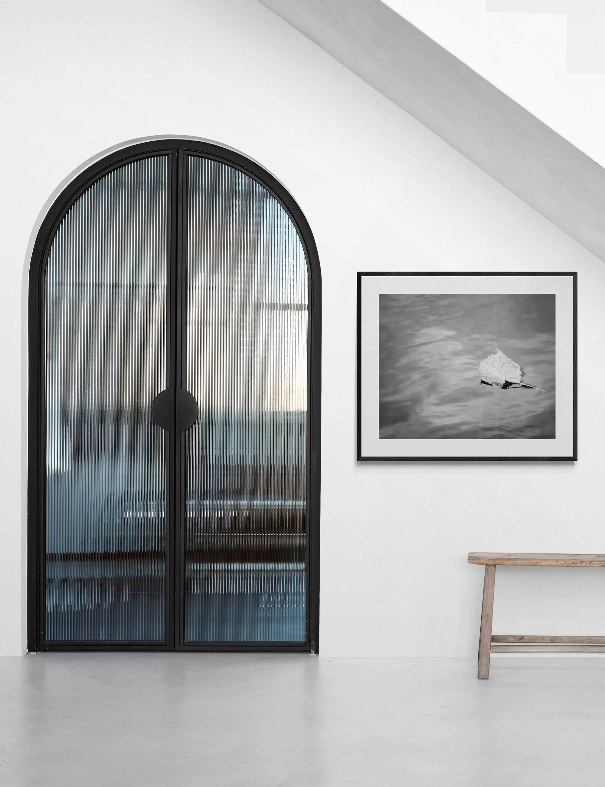 "Tranquility" is a conceptual infrared fine art photograph from the Drifting Destinies series displayed in a minimalist contemporary interior.