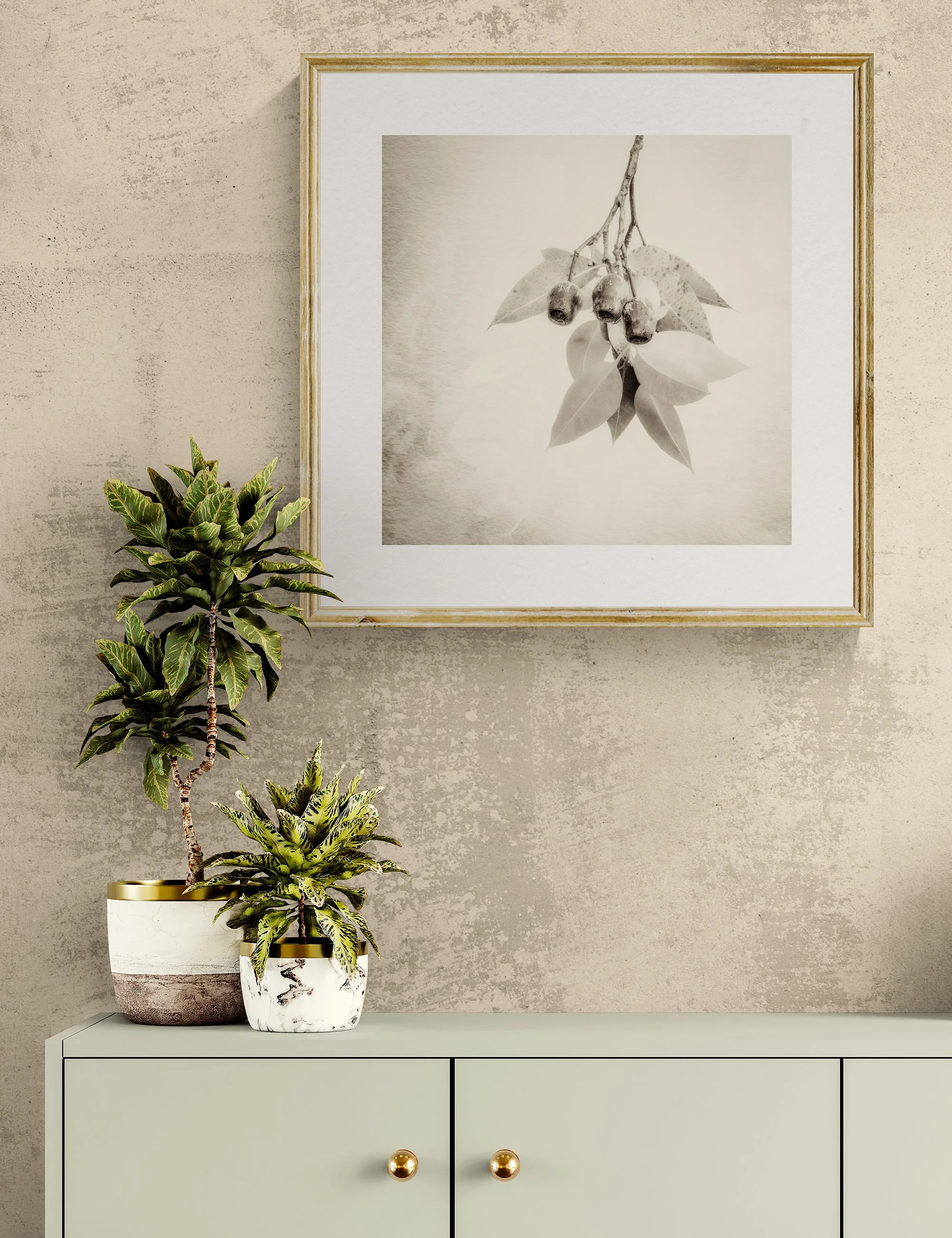 "Now and Then" from the Gumnut Gestures series by Ian J. Muirhead Arts, displayed in a contemporary interior above a minimalist cabinet with botanical styling and a light timber frame.