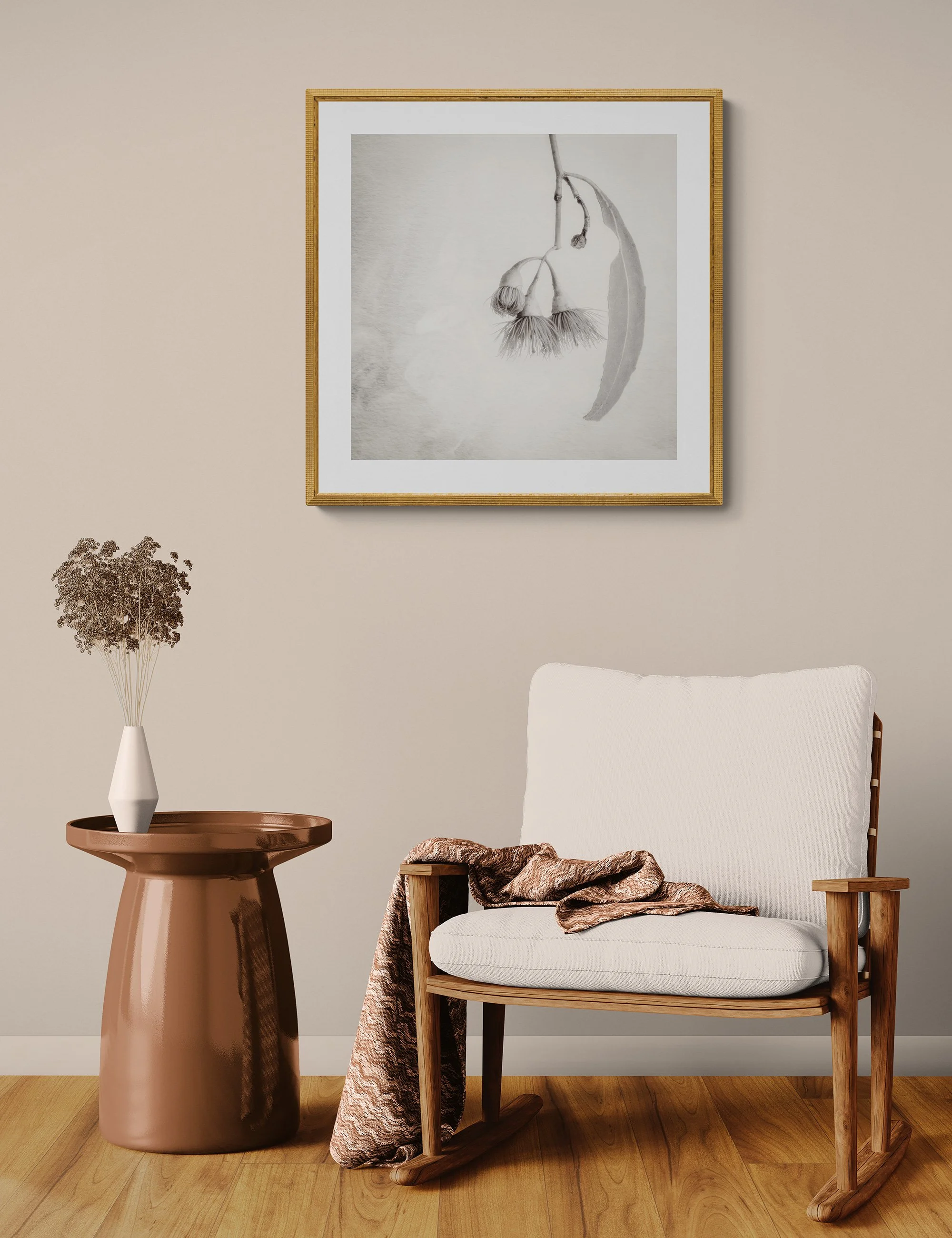 "Nature's Chandelier" by Ian J Muirhead displayed as a framed botanical fine art print in a warm neutral contemporary interior with timber chair and side table.