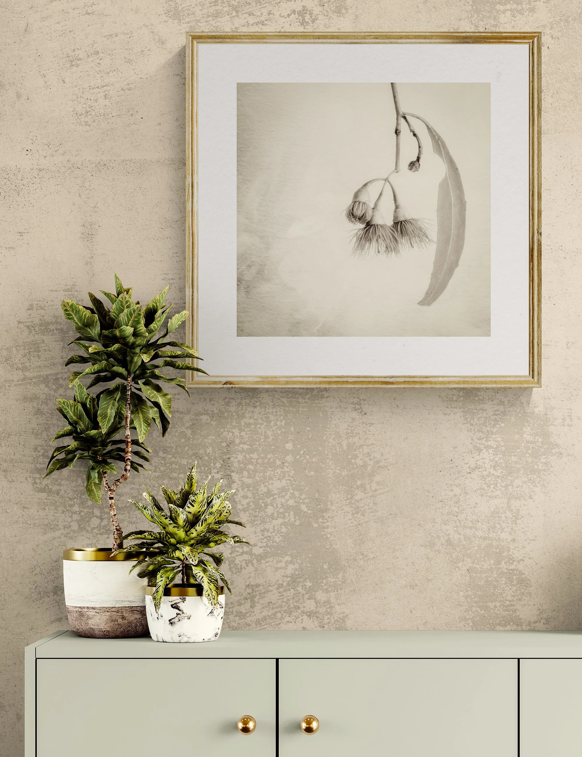 ”‘Nature's Chandelier" from the Gumnut Gestures series by Ian J. Muirhead Arts, displayed in a contemporary interior above a minimalist cabinet with botanical styling and a light timber frame.