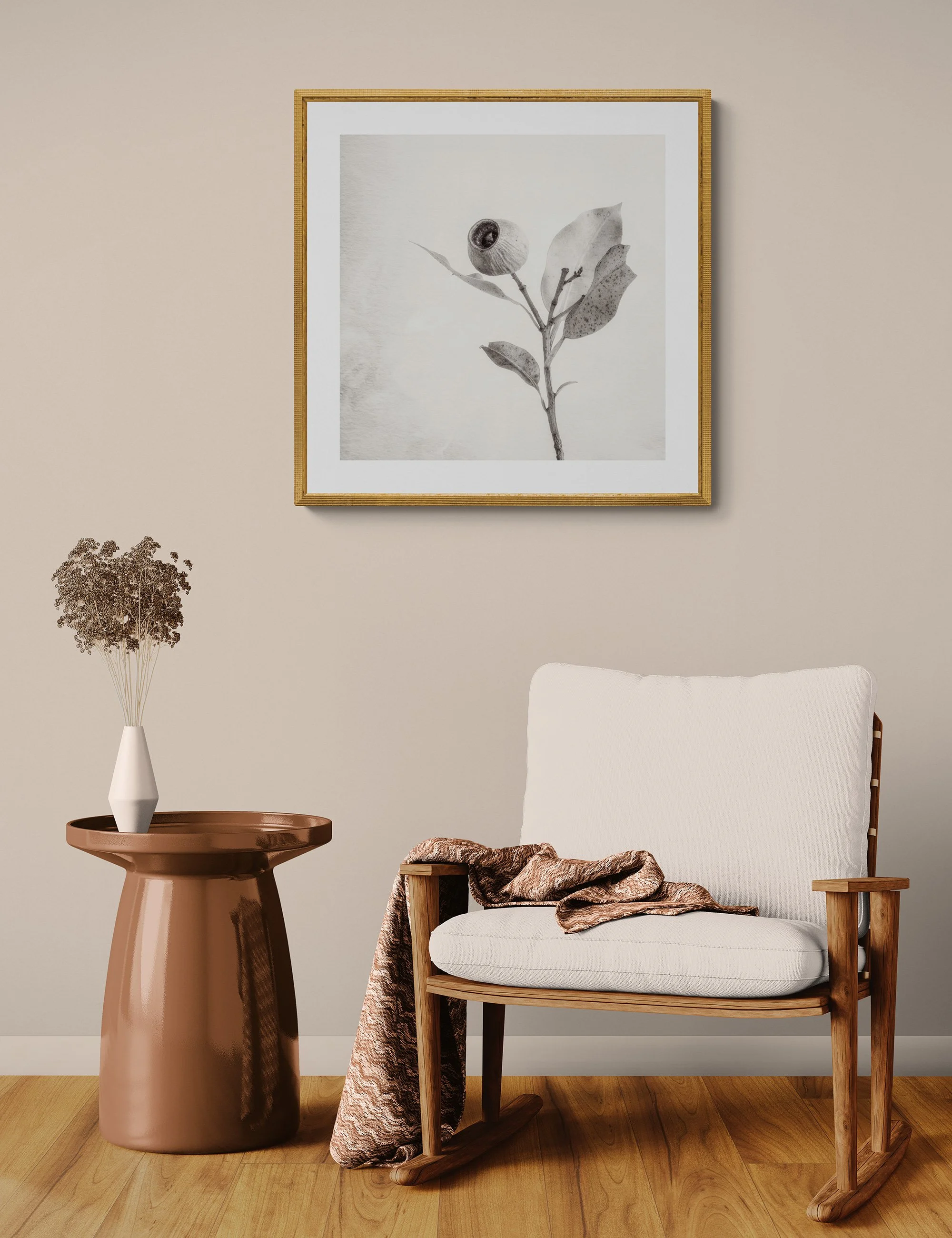 "Singular Elegance" by Ian J Muirhead displayed as a framed botanical fine art print in a warm neutral contemporary interior with timber chair and side table.