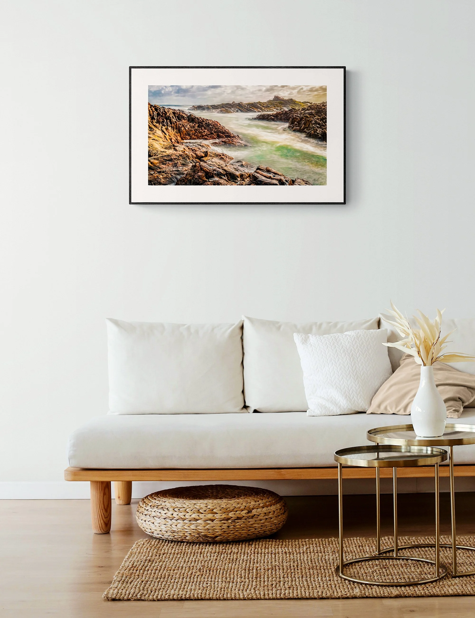 "Swell at Canal Rocks" from the Secluded Shorelines series by Ian J. Muirhead Arts, displayed as a framed minimalist seascape print in a natural contemporary interior.