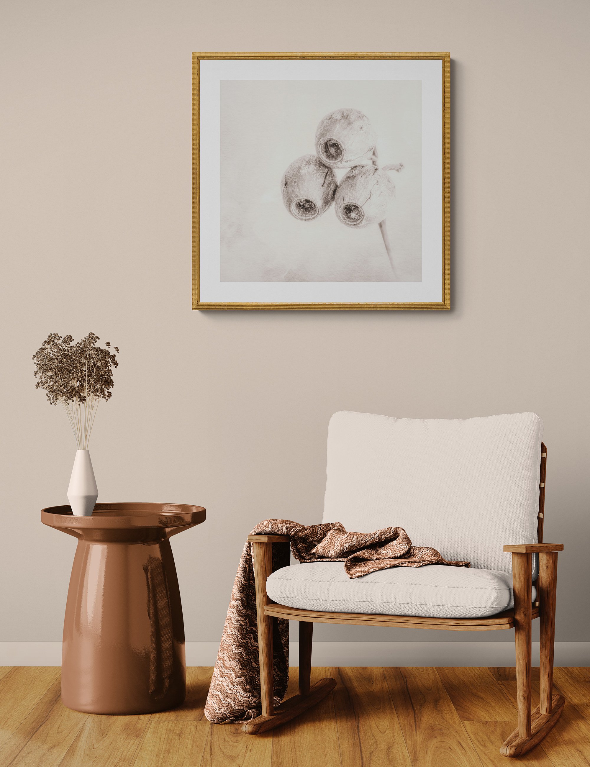 "Eyes of Vigilance" by Ian J Muirhead displayed as a framed botanical fine art print in a warm neutral contemporary interior with timber chair and side table.