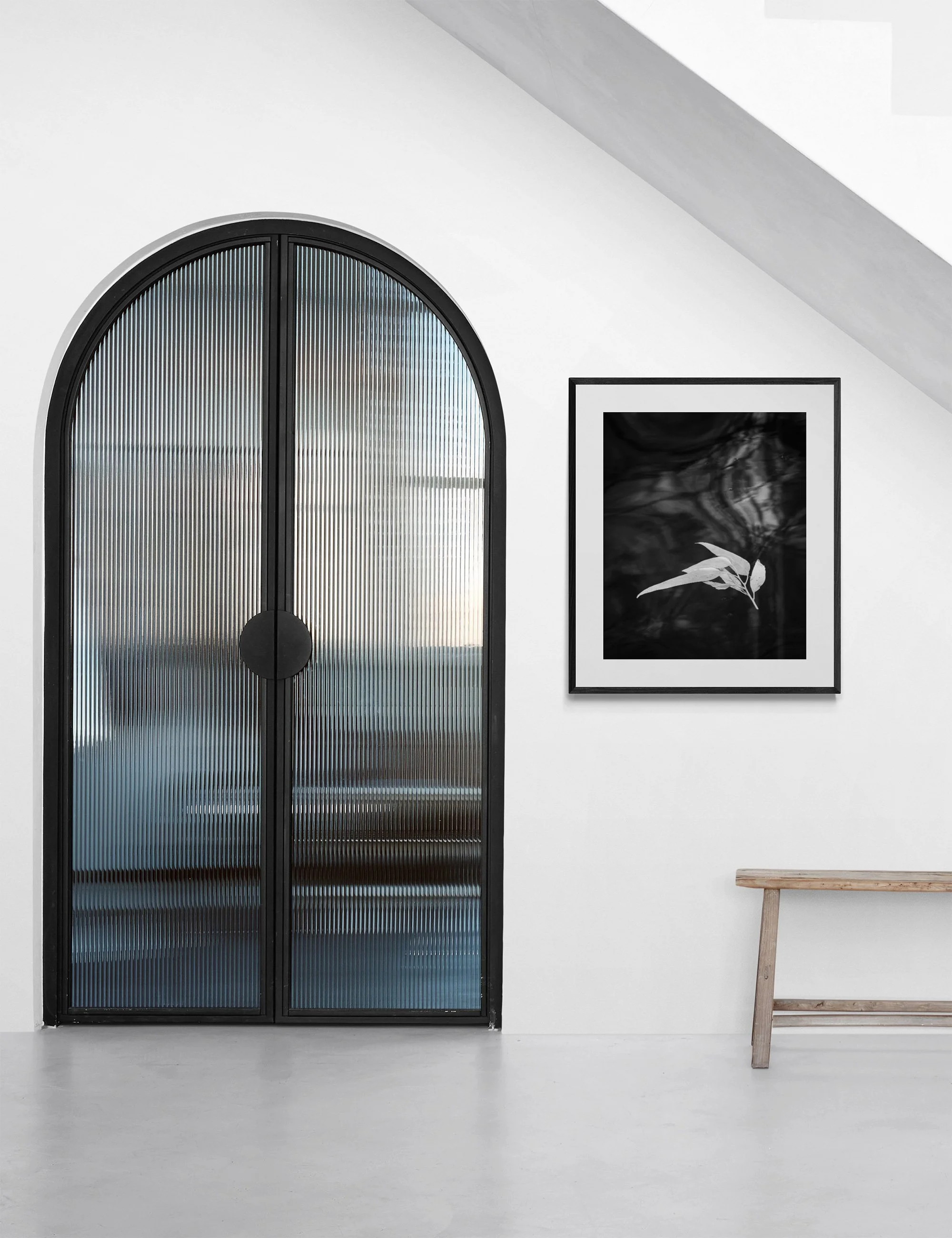 "Kinship" is a conceptual infrared fine art photograph from the Drifting Destinies series displayed in a minimalist contemporary interior.