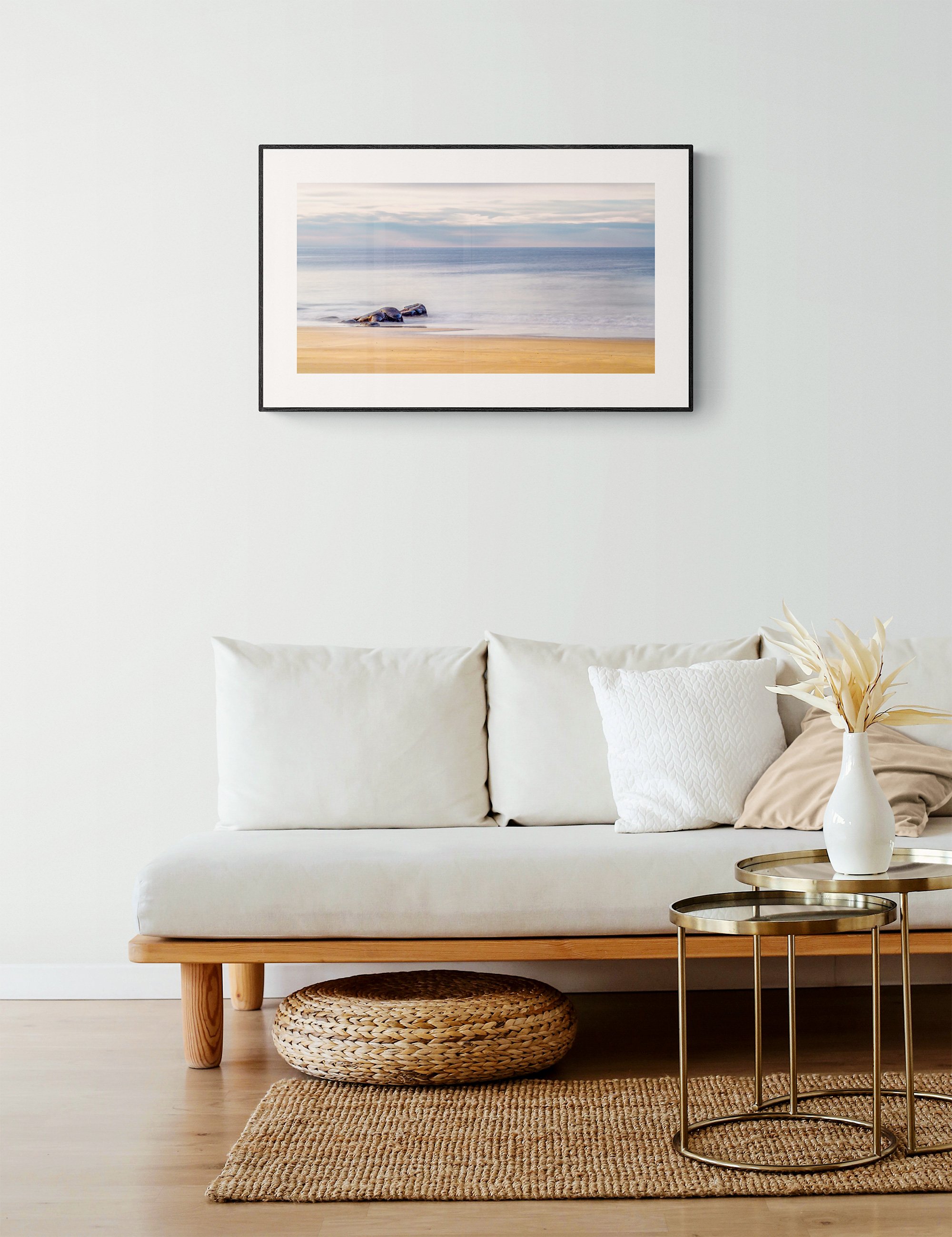 "Tranquil Tides" from the Secluded Shorelines series by Ian J. Muirhead Arts, displayed as a framed minimalist seascape print in a natural contemporary interior.