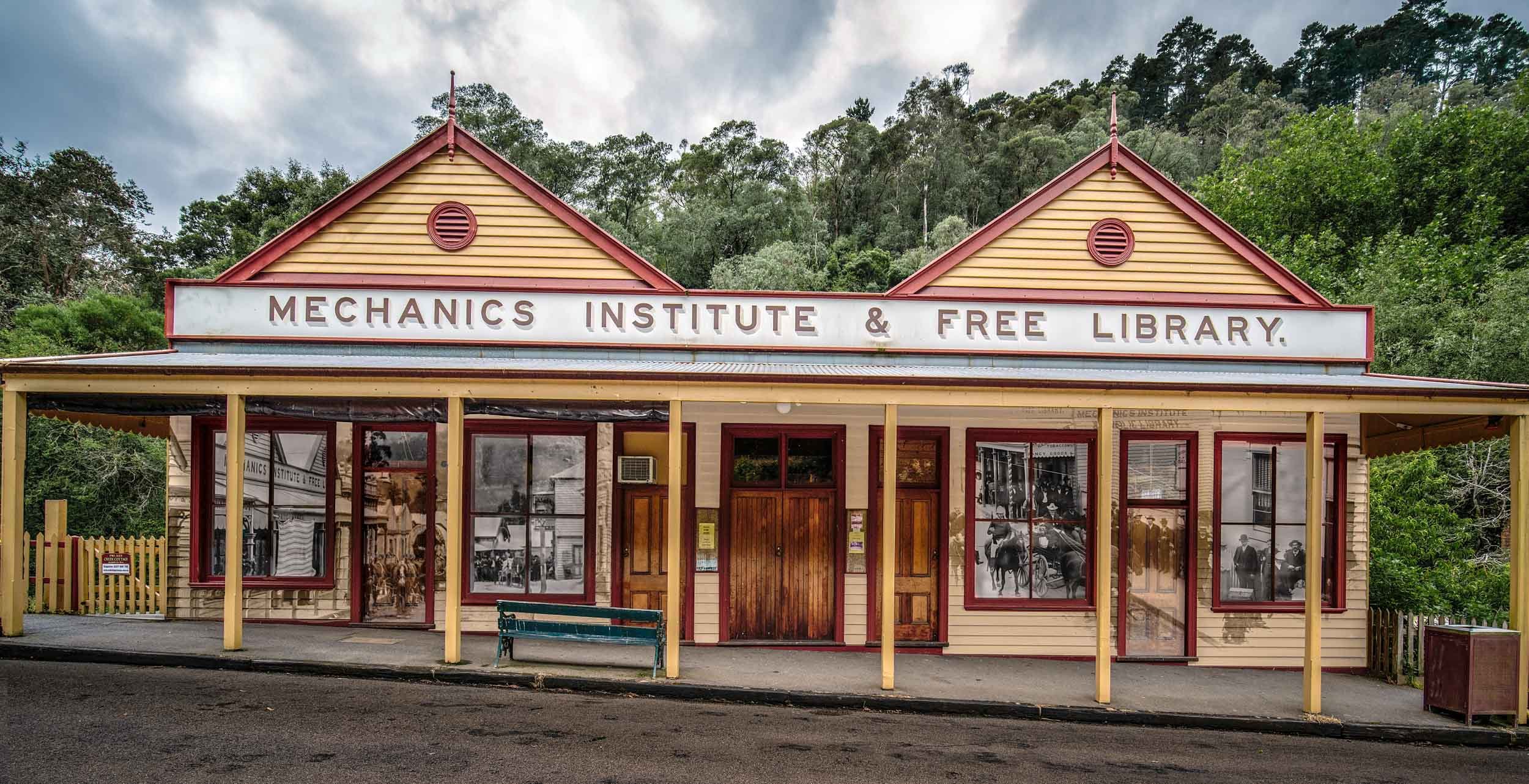 A rebuilt version of the original Walhalla Mechanics Institute and Free Library with superimposed images showing the original buliding
