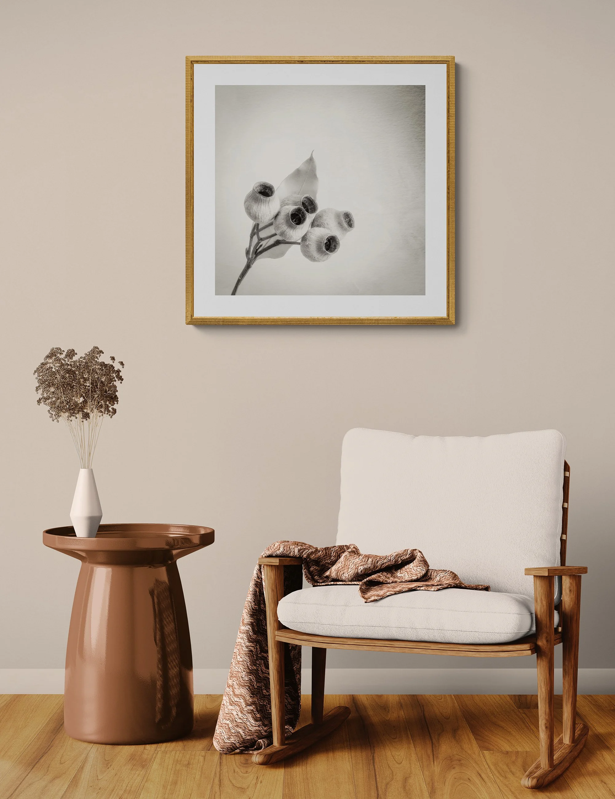 "Togetherness" by Ian J Muirhead displayed as a framed botanical fine art print in a warm neutral contemporary interior with timber chair and side table.