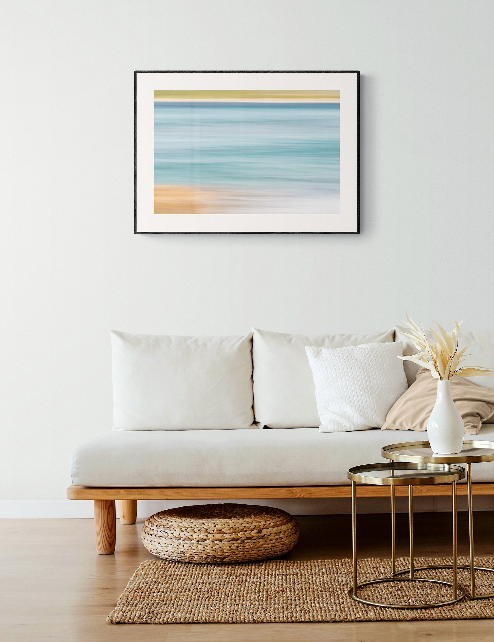 "Chromatic Currents" from the Secluded Shorelines series by Ian J. Muirhead Arts, displayed as a framed minimalist seascape print in a natural contemporary interior.