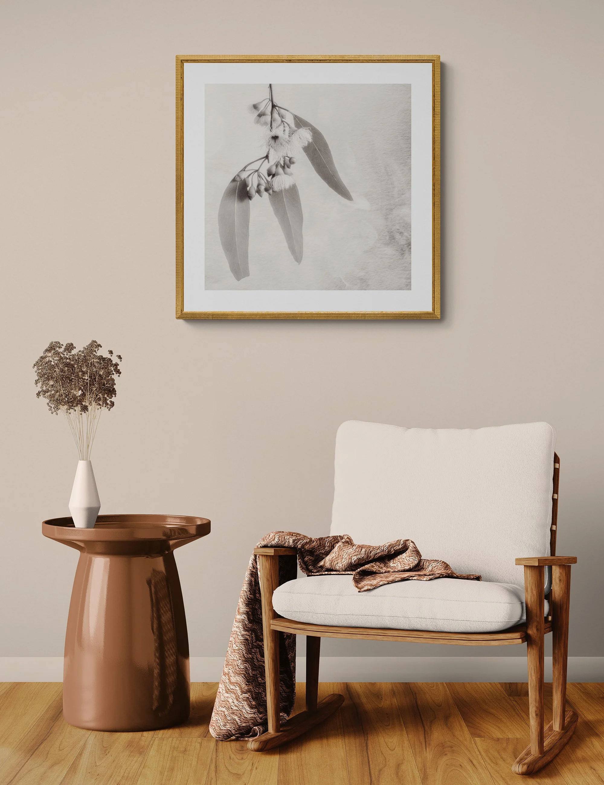 "Nature's Bouquet" by Ian J Muirhead displayed as a framed botanical fine art print in a warm neutral contemporary interior with timber chair and side table.