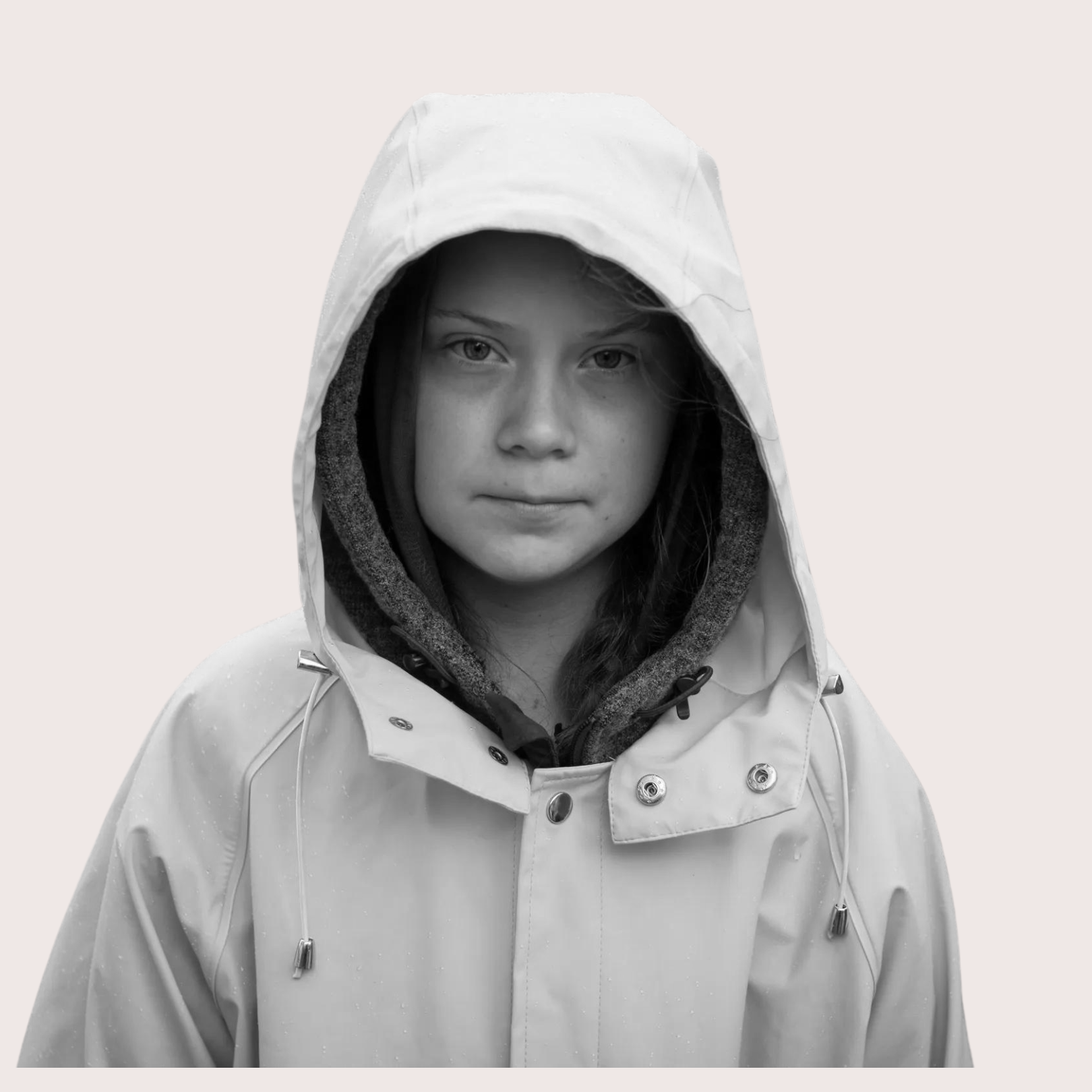 A young woman wearing a hooded raincoat with droplets of water, looking directly at the camera. Women’s confidence empowerment training course