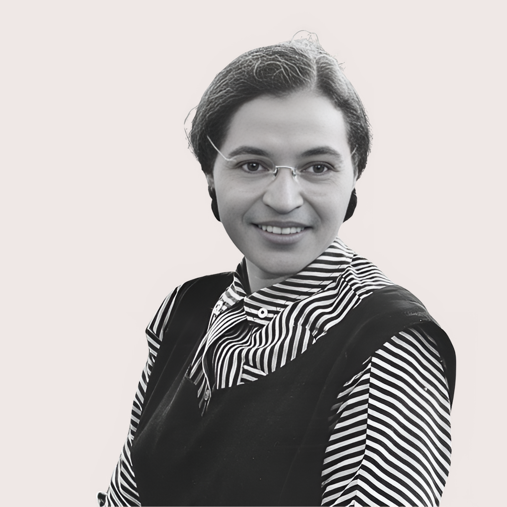 Black and white portrait of a smiling person with short hair, glasses, and striped shirt, looking directly at the camera. Confidence development and self-esteem courses