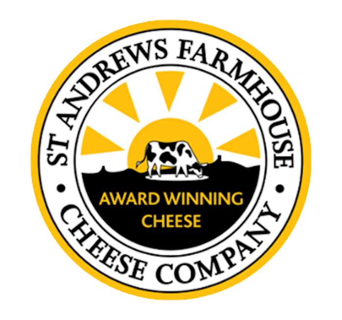 Logo for St Andrews Farmhouse Cheese Company featuring a black and white cow, sun rays, and the text 'Award Winning Cheese'.