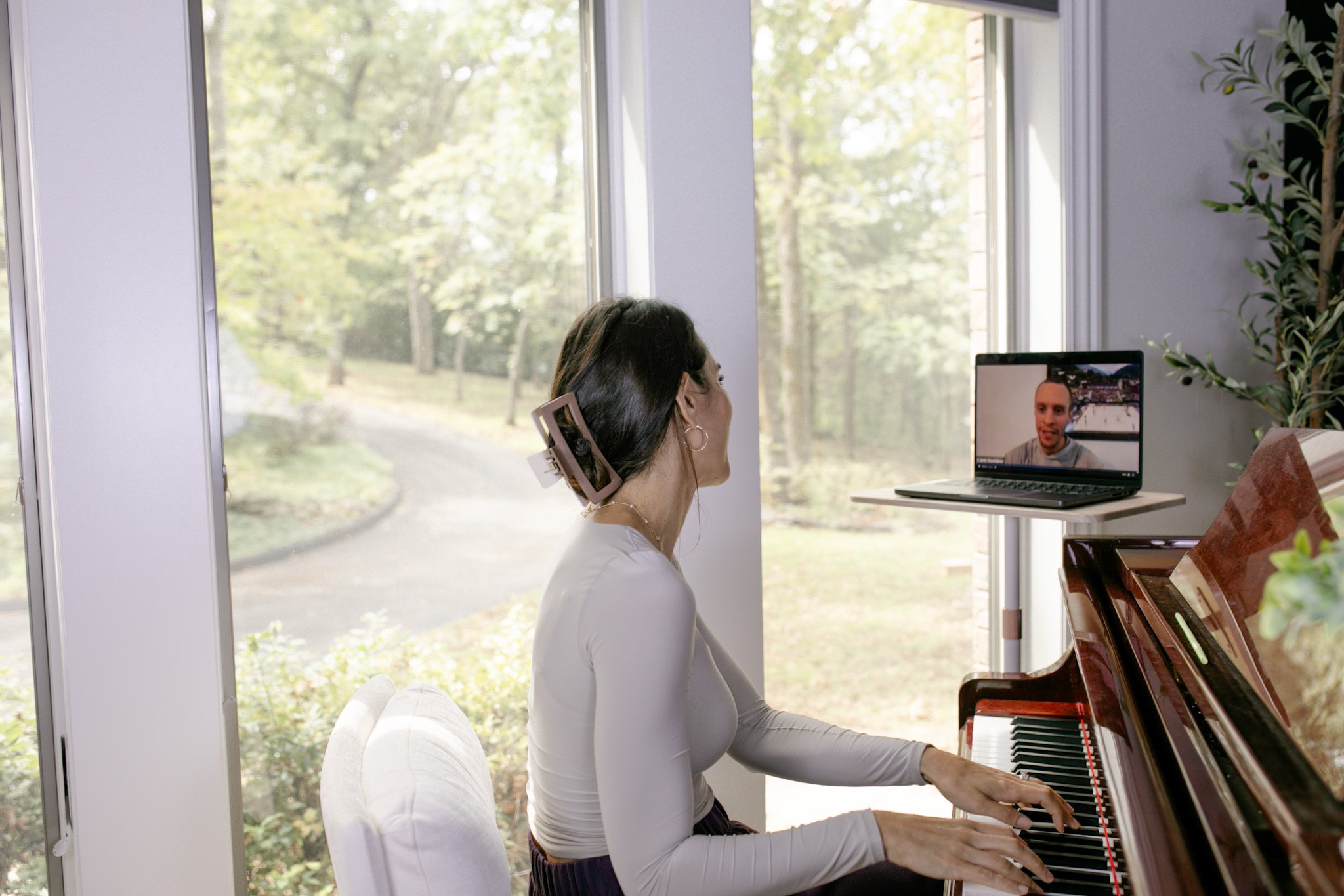 Monica Sadler leading a student through a vocal warm-up