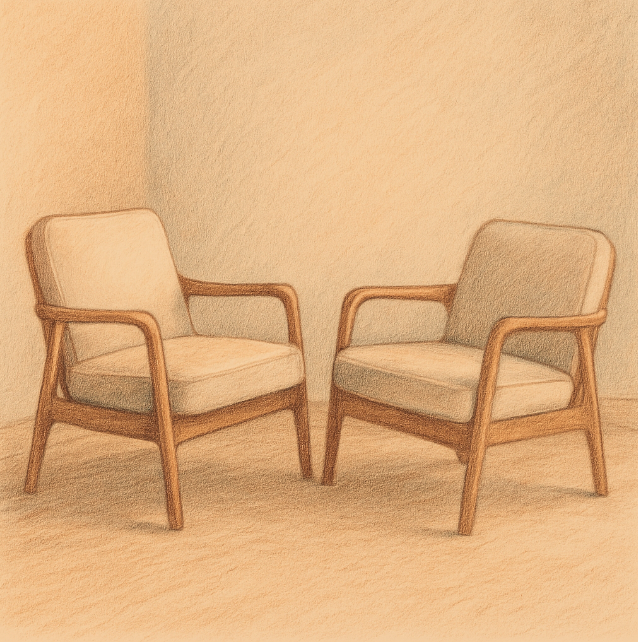 Two chairs in a peaceful counseling room representing a safe space for online trauma counseling California.