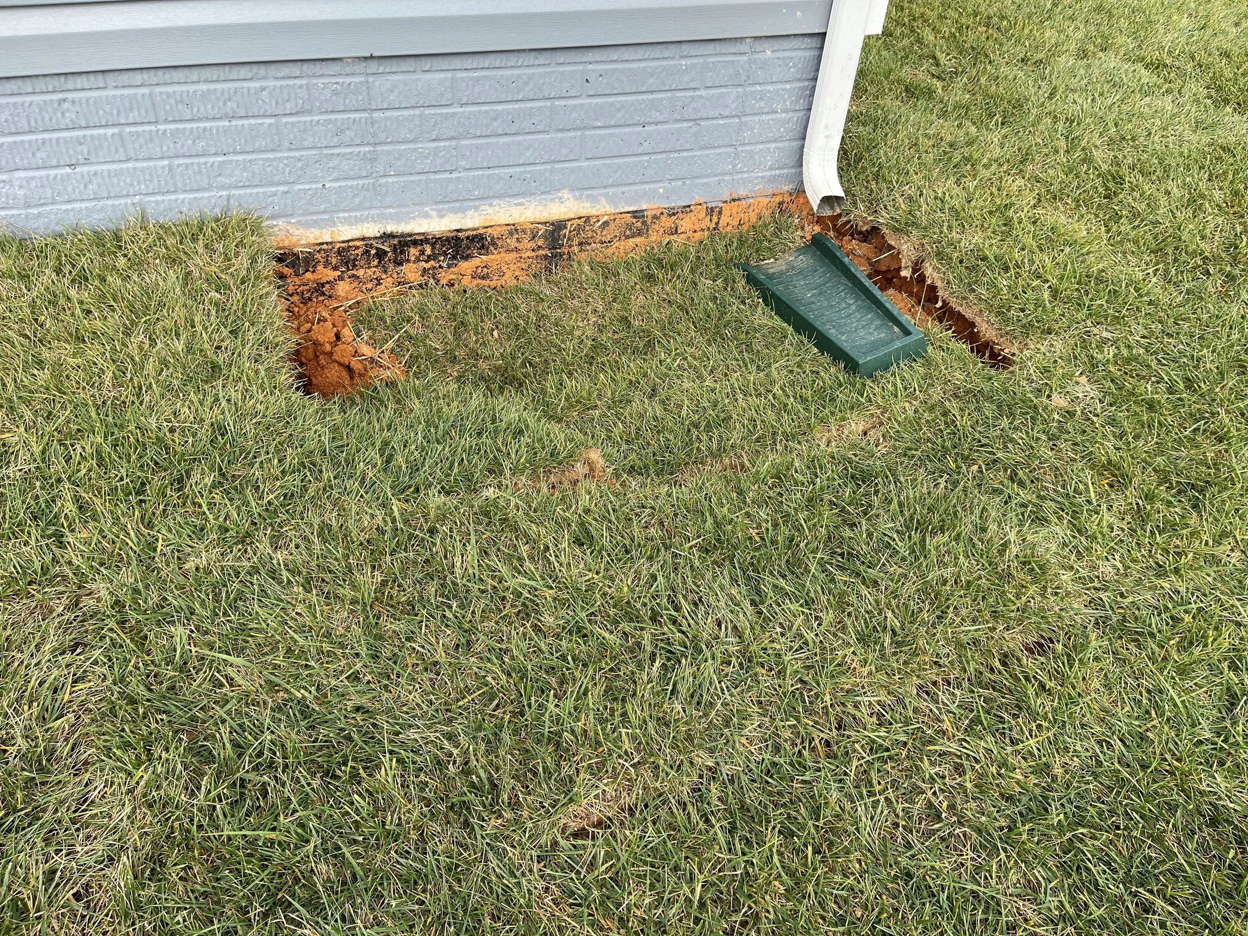 Largest sinkhole at back of the right side of home; hole has continued to deepen since November 21