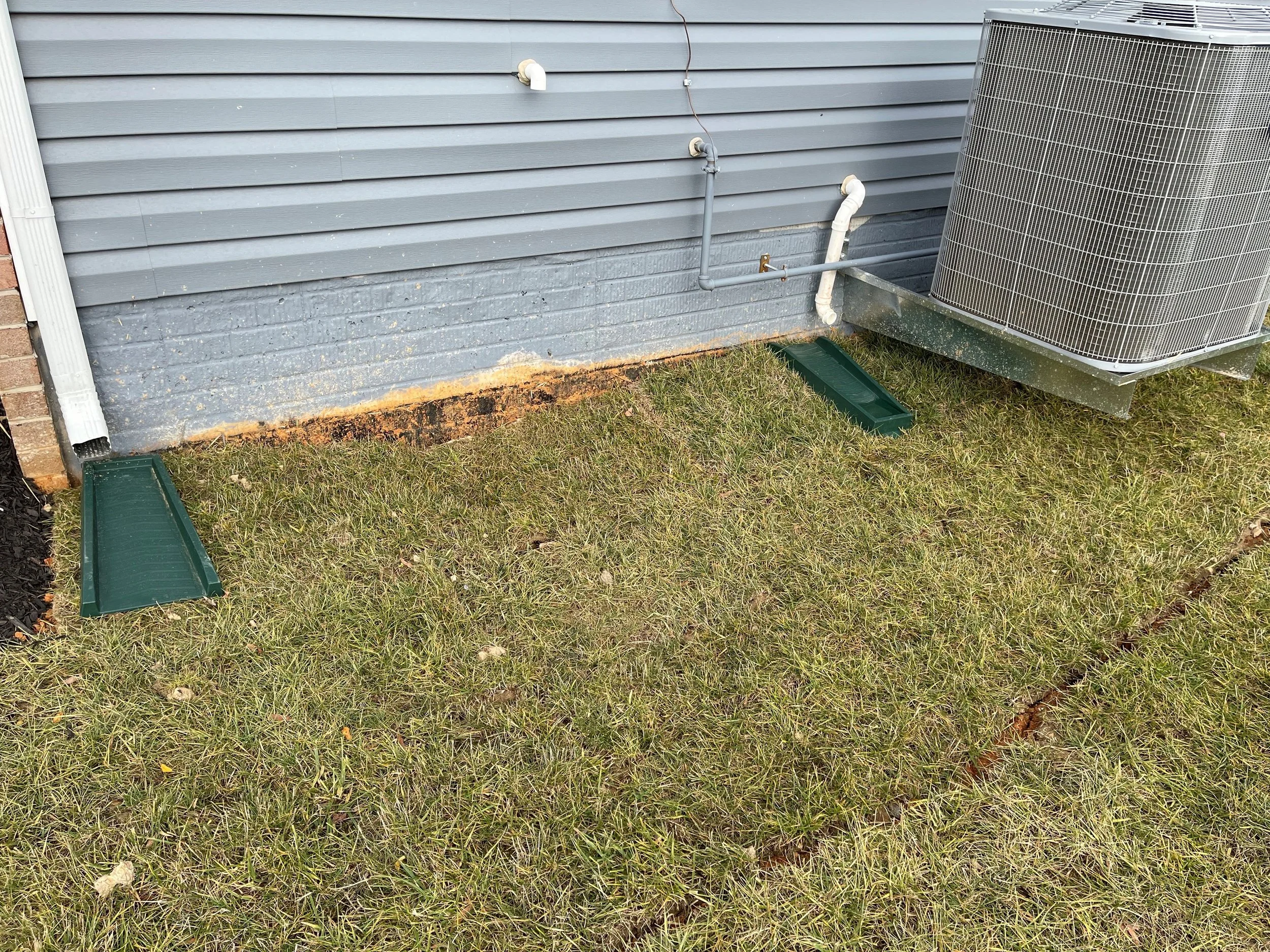 Front right side of home; since November 21 the hold has expanded outward from the home and the sod is separating in multiple areas as the sinkhole widens.