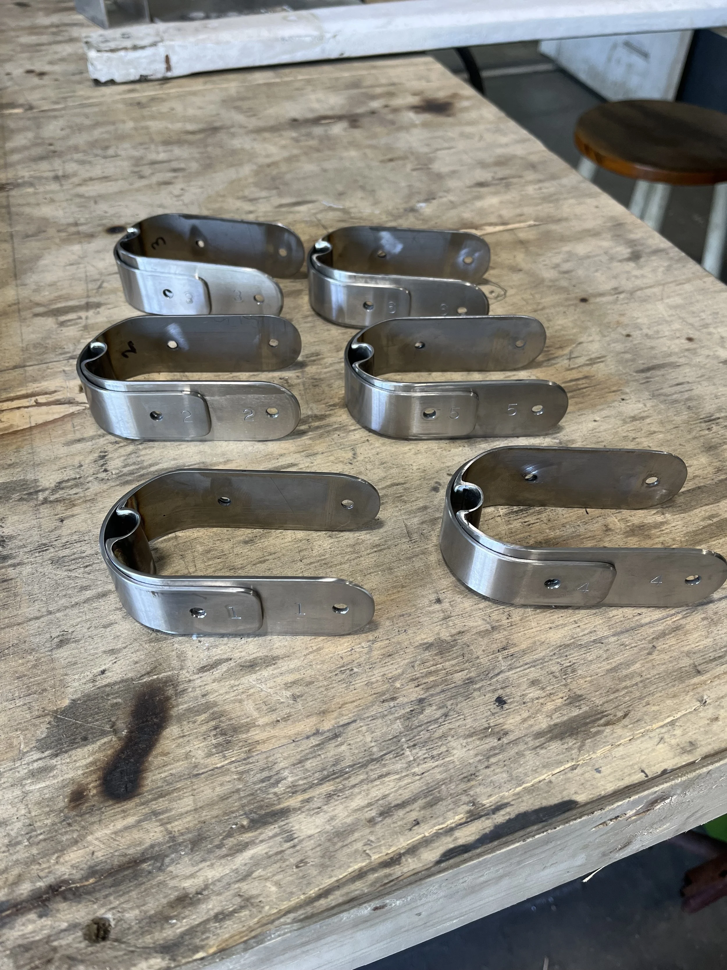 Spreader Tip Shroud Clamps