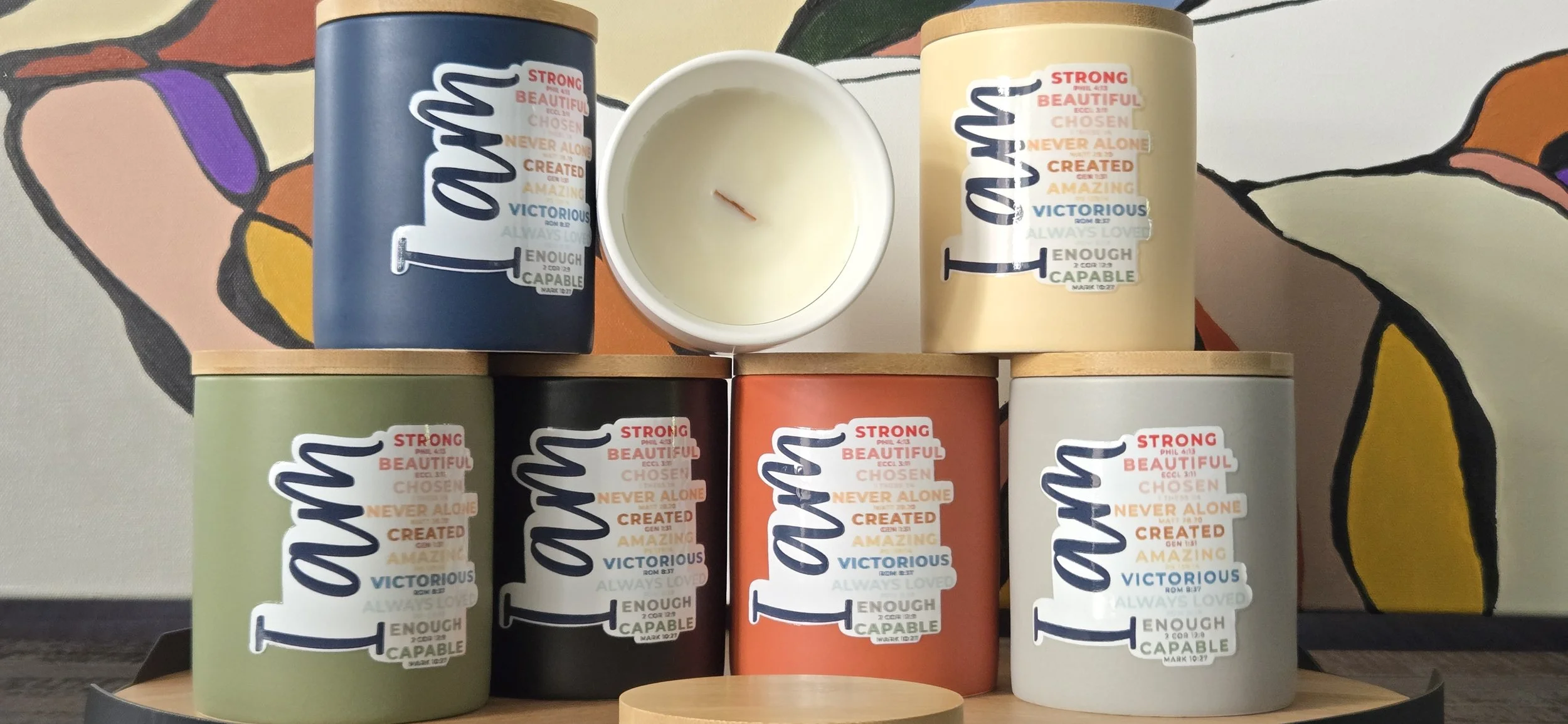 Affirmation candles in a range of vessel colors. Custom-work example; available options are confirmed with your quote.
