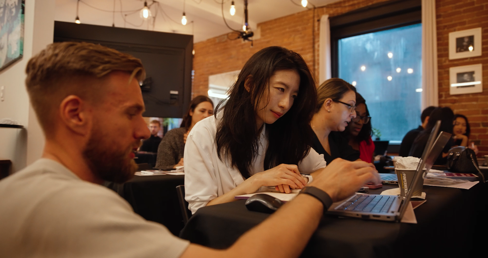 Cirface member helping an Asana user during Asana on Tour in Toronto