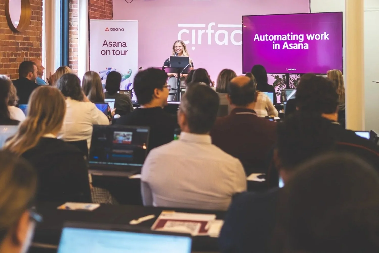 Certified Asana expert delivering training on the tool