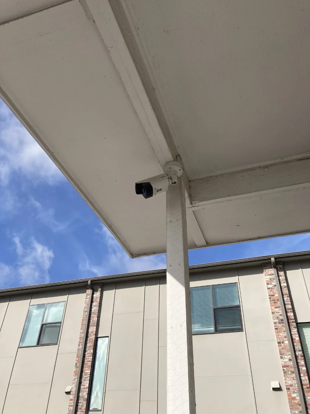 A security camera in an apartment complex