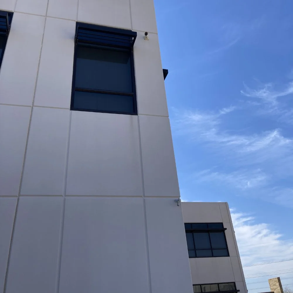 A security camera on a building exterior