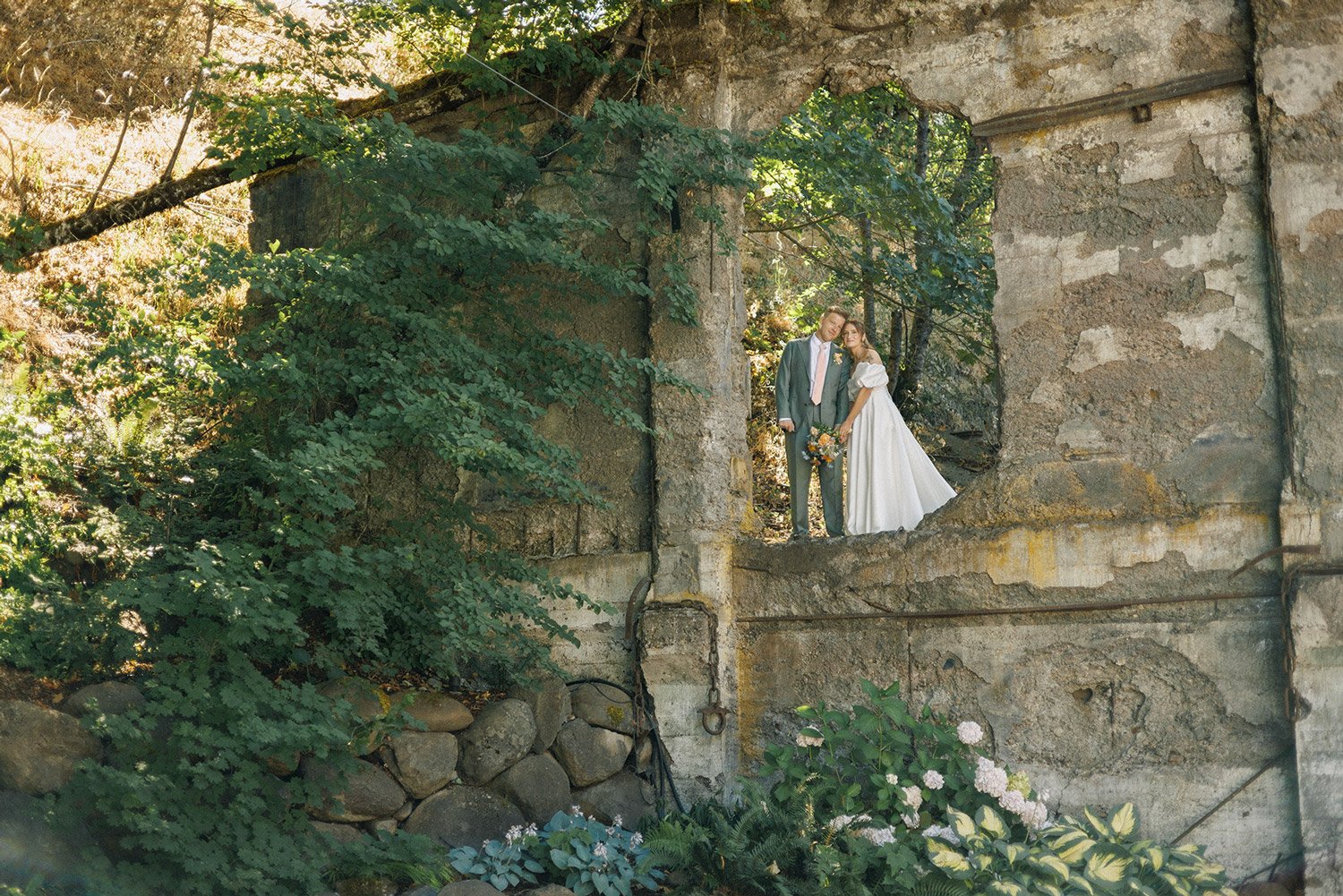 Paige and Kjell outdoor portrait with the Columbia River Gorge backdrop.