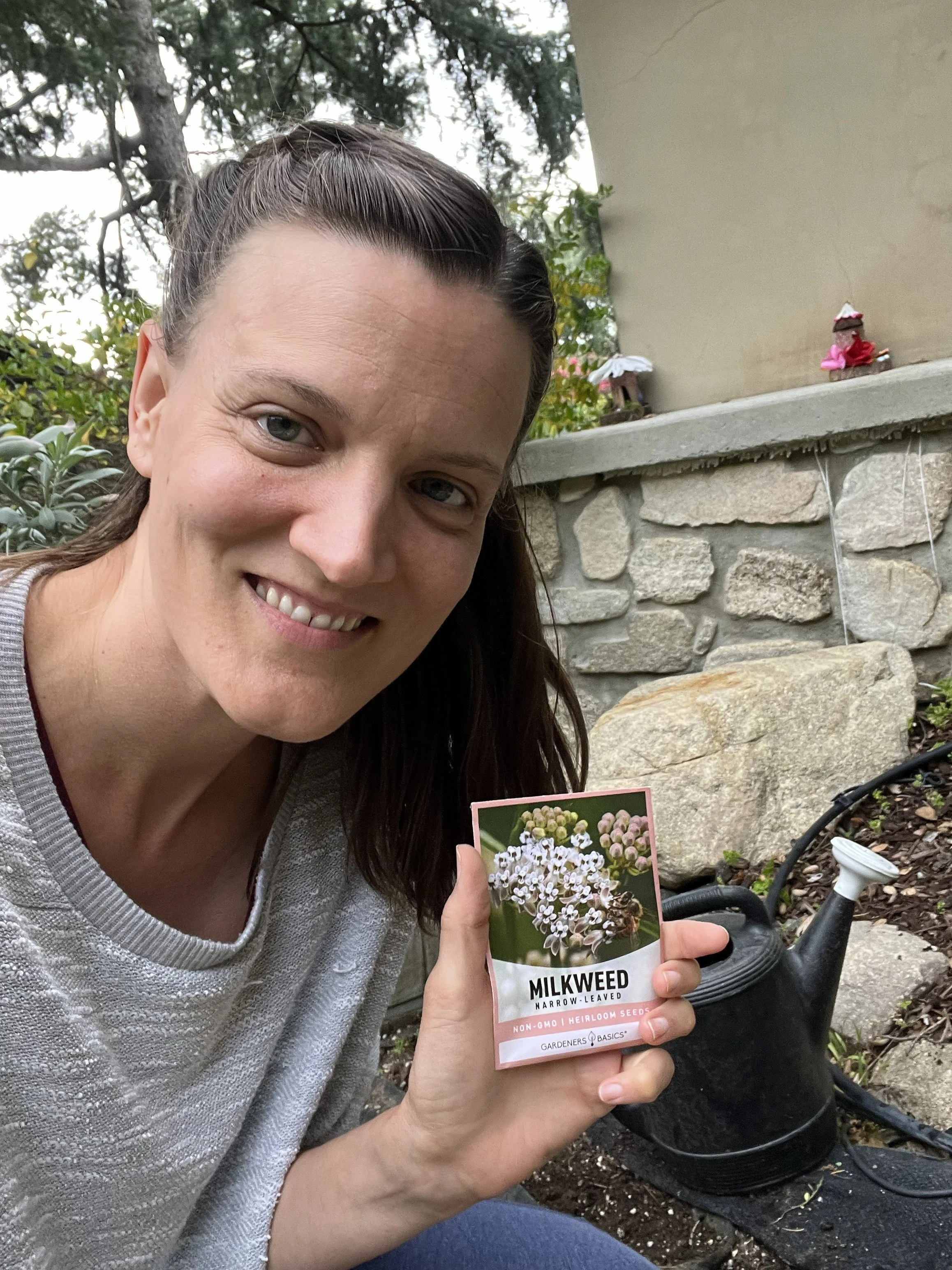 Janet with Milkweed Seeds.jpg