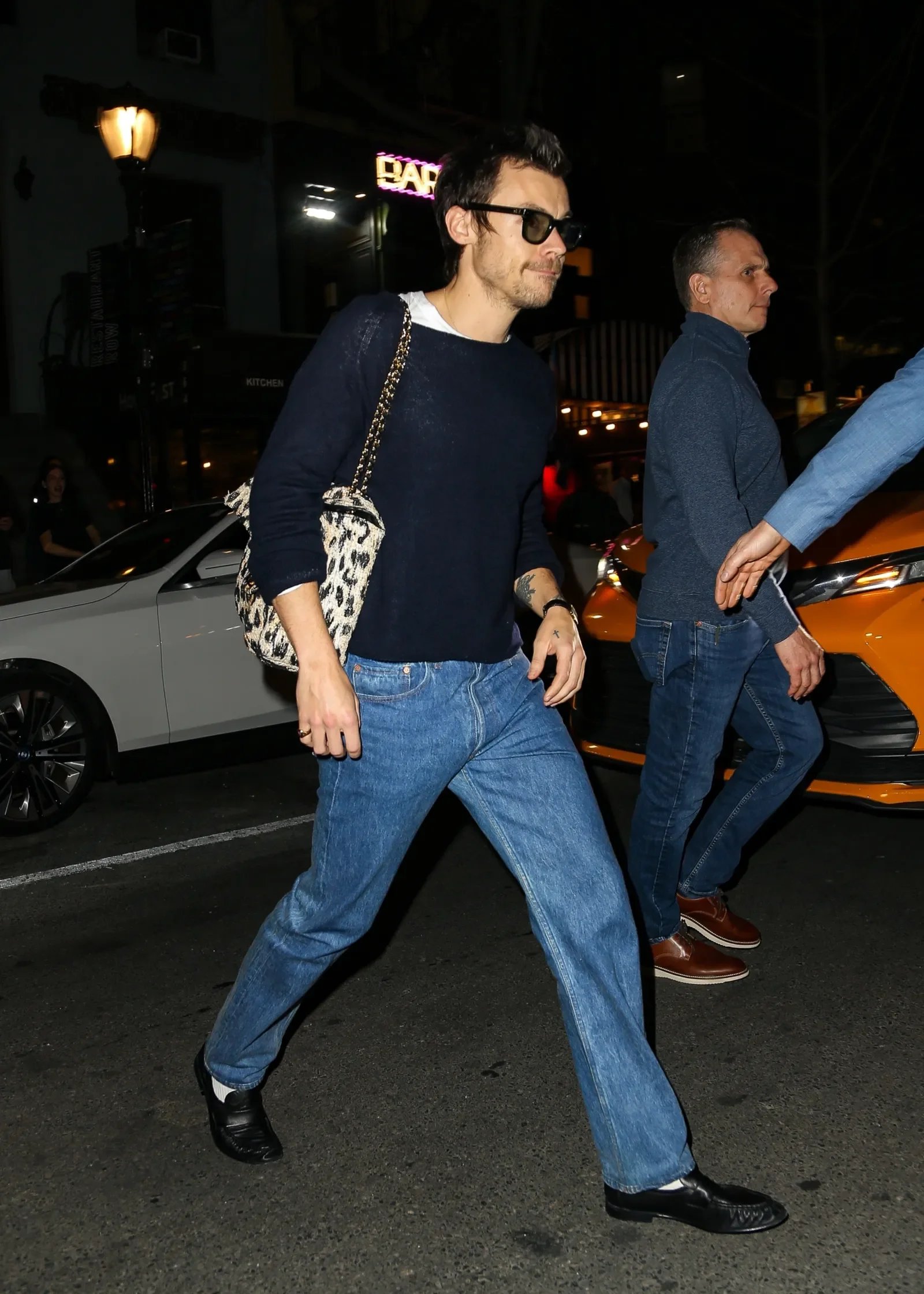 Harry Styles Steps Out in a Leopard Print Chanel Bag in NYC