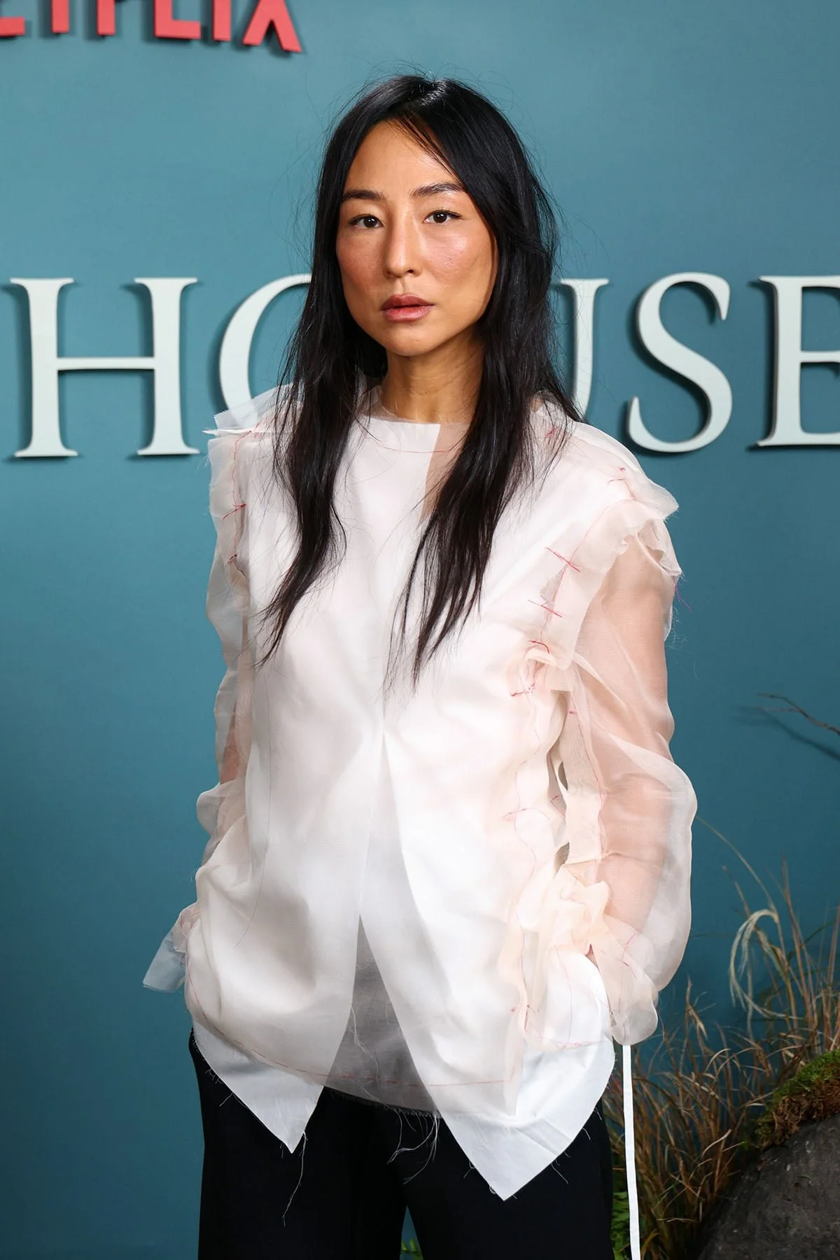 Greta Lee Looks Chic in The Row at The Last House Photocall